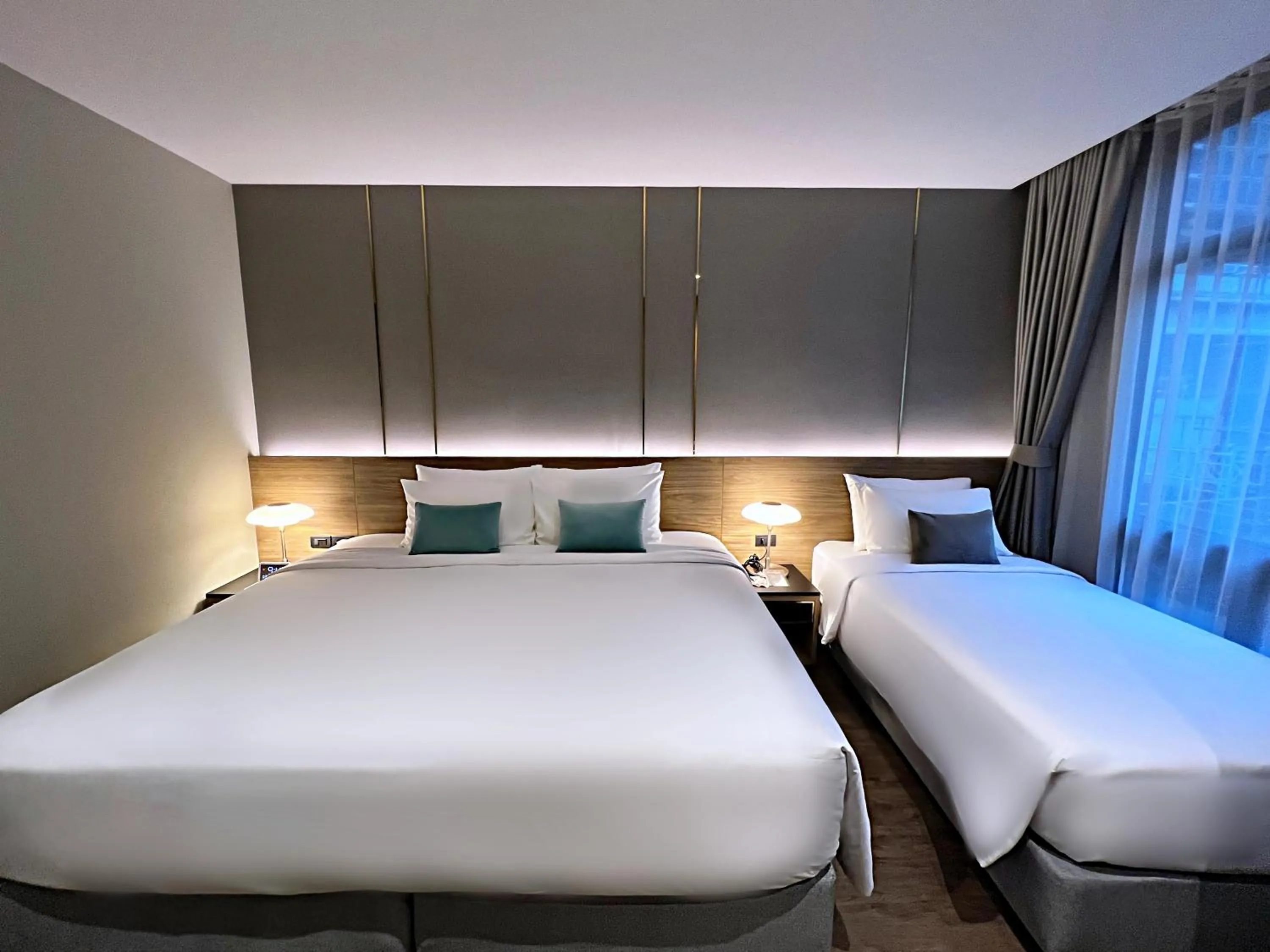 Photo of the whole room, Bed in SAM E Hotel Bangkok Sathorn