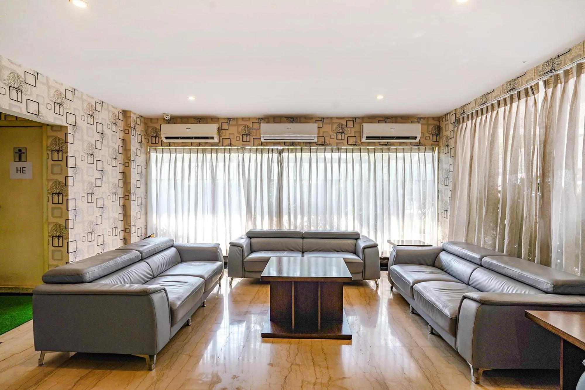 Seating area in FabHotel Prime D Dev - Nr Vijayawada Club