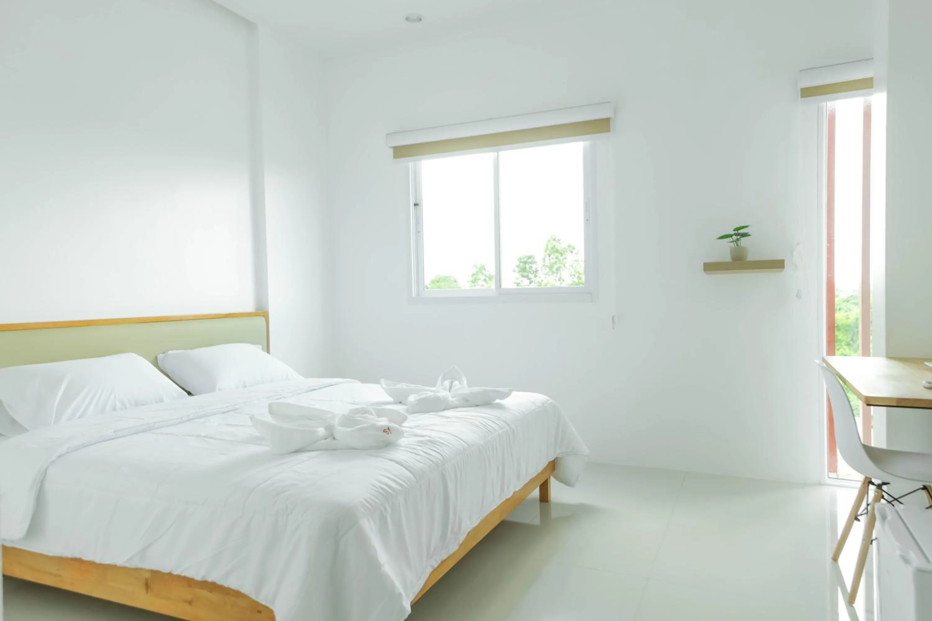 Bed in S1 Trang Hotel