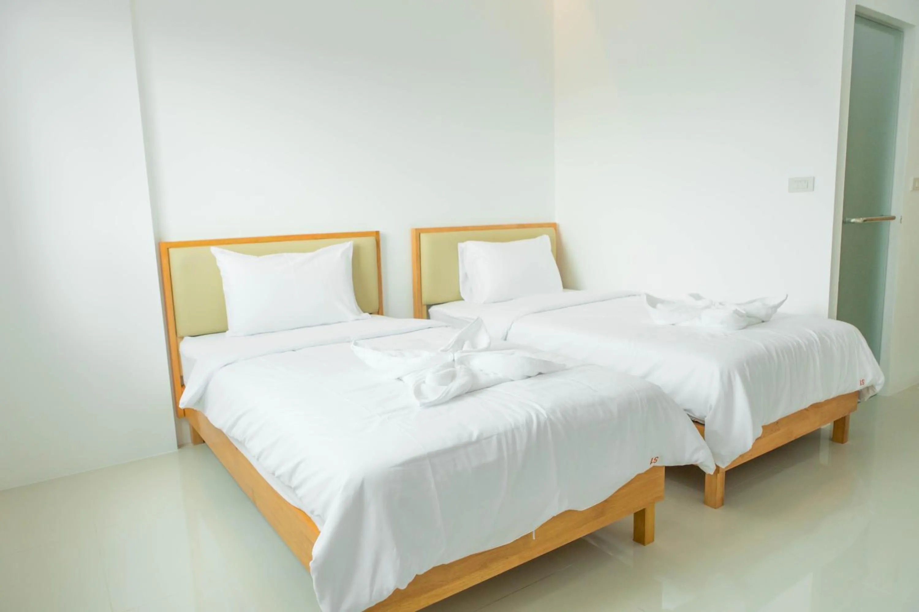 Bed in S1 Trang Hotel