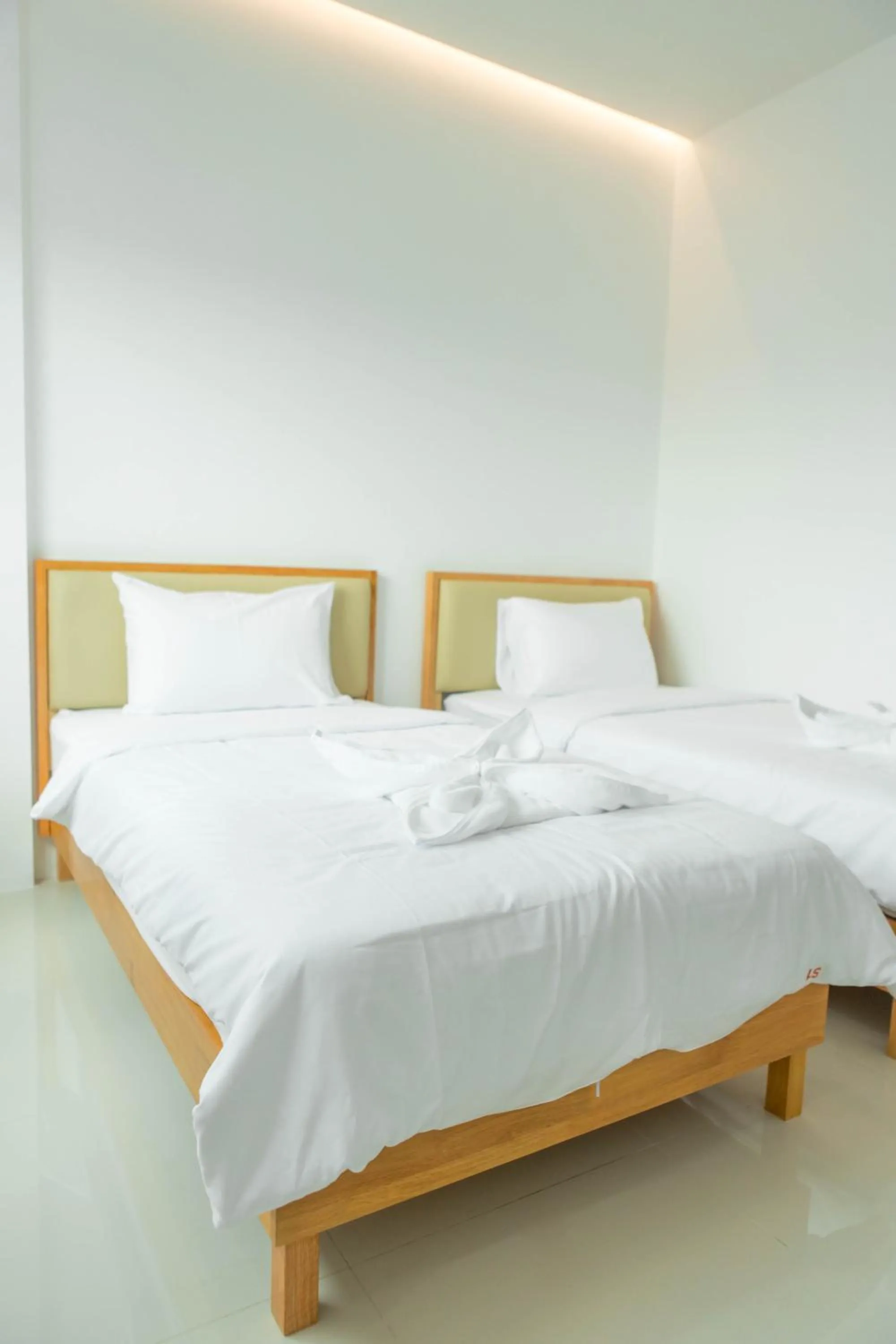 Bed in S1 Trang Hotel