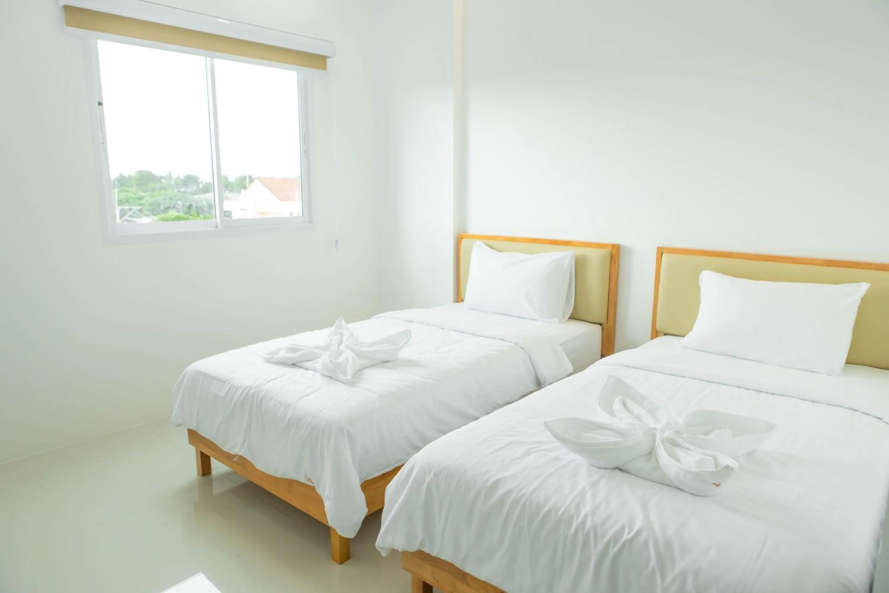 Bed in S1 Trang Hotel