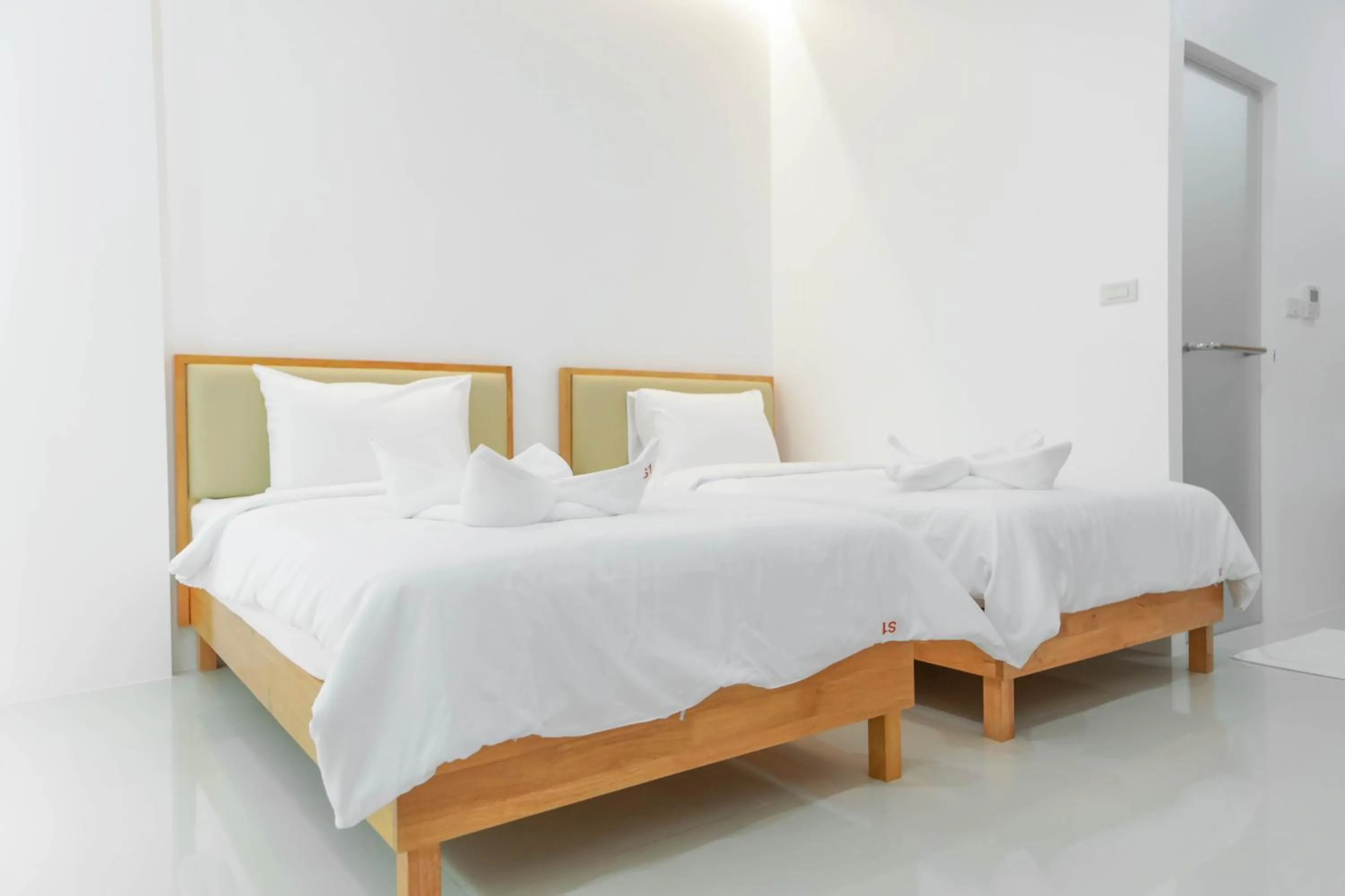 Bed in S1 Trang Hotel