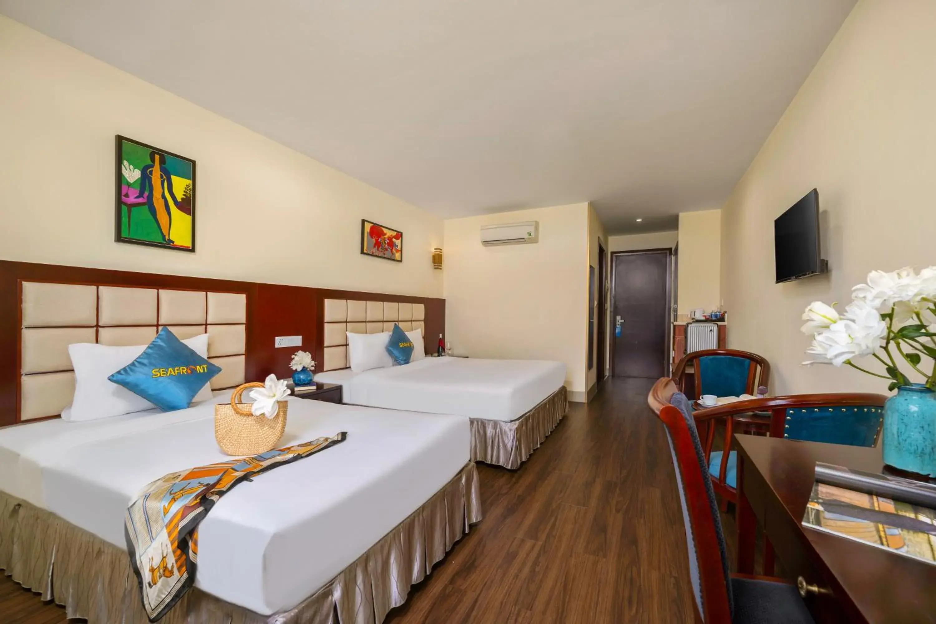 Deluxe Triple Room with Sea View in SeaFront Hotel DaNang Deluxe Triple Room with Sea View in SeaFront Hotel DaNang