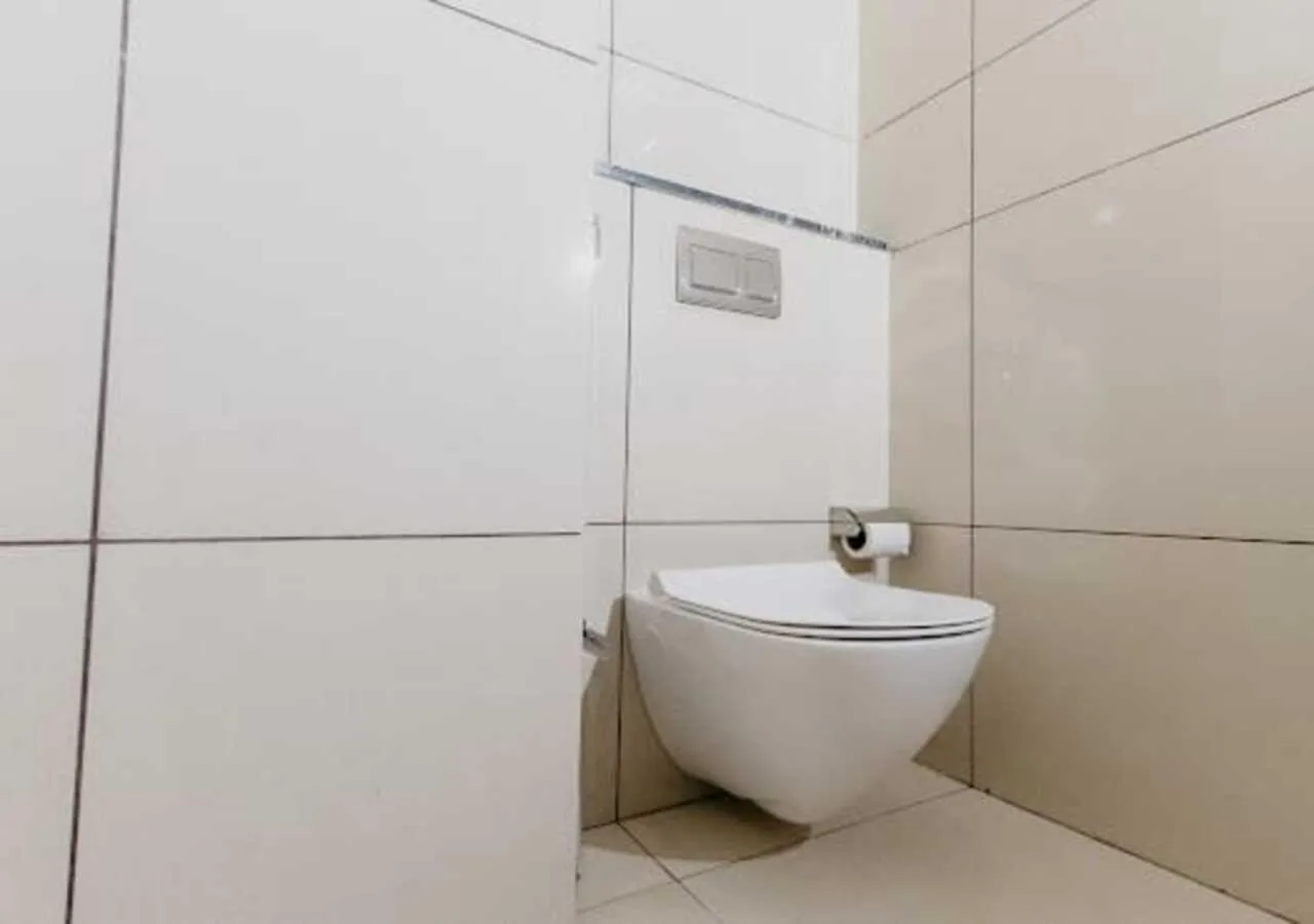 Toilet in HOTEL EMERALD INN