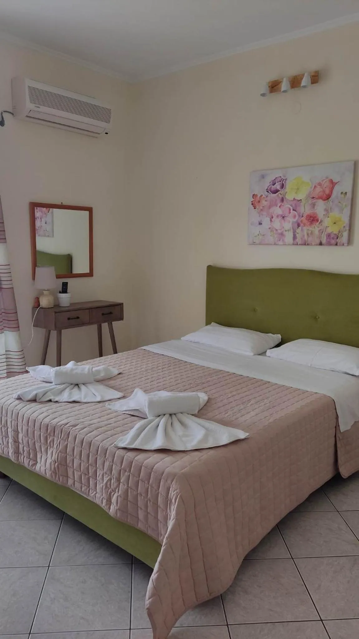 Bed in EVIA DREAM FAMILY APARTMENTS
