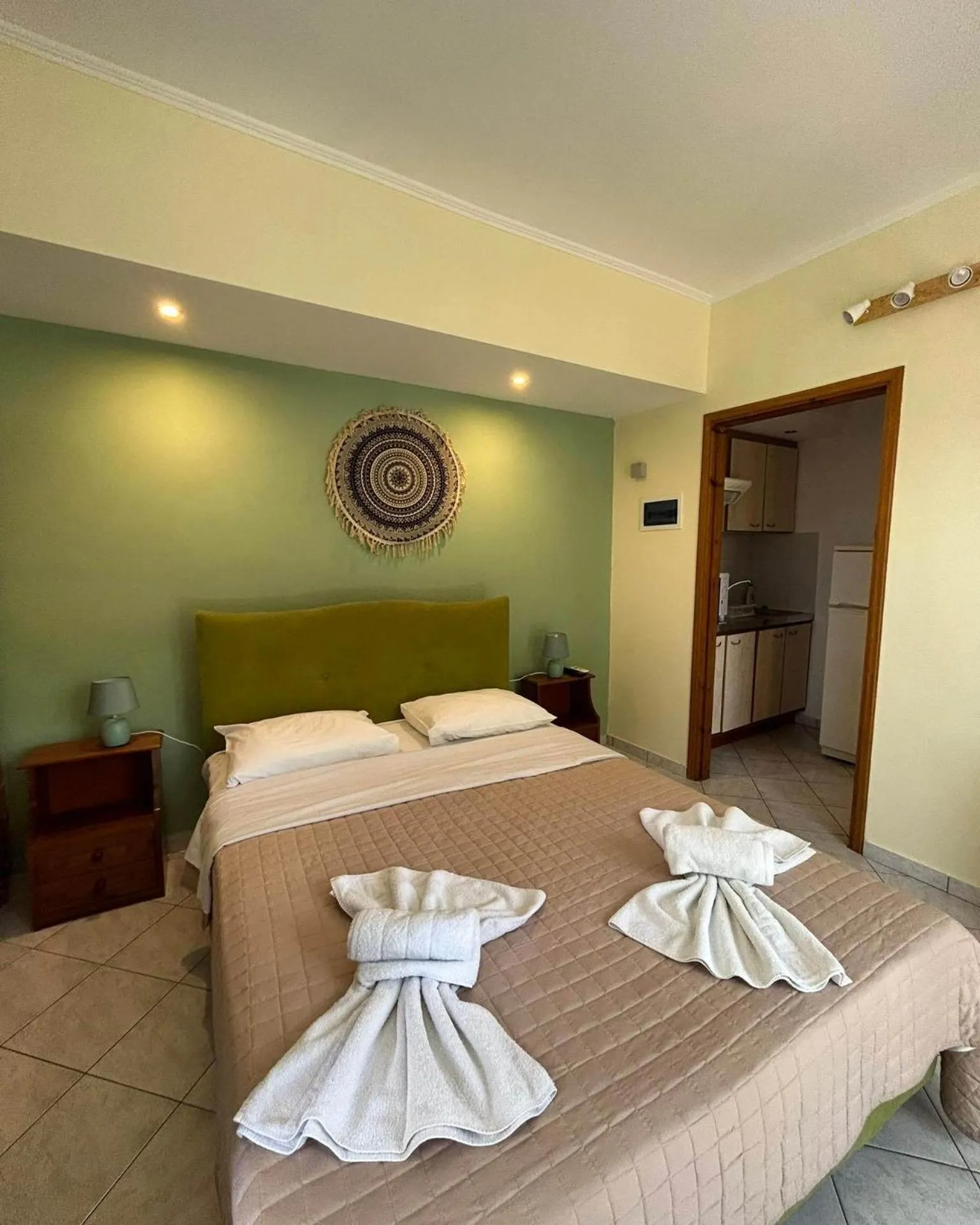 Bed in EVIA DREAM FAMILY APARTMENTS