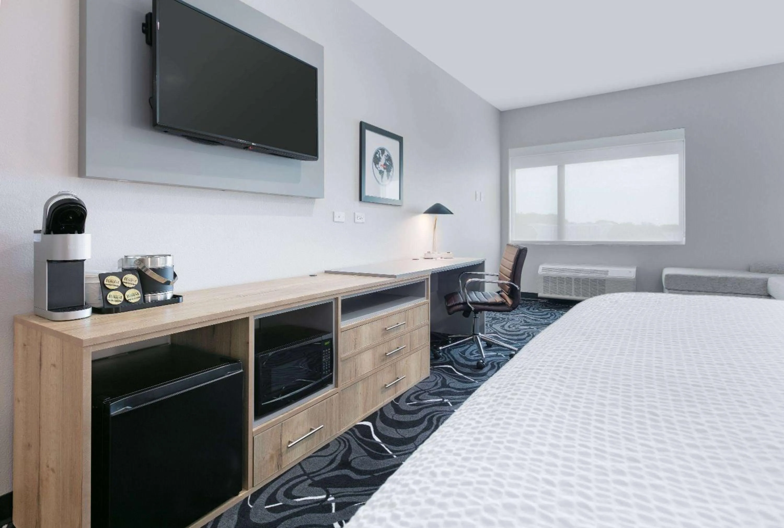 Bed in The Elm, a Ramada by Wyndham