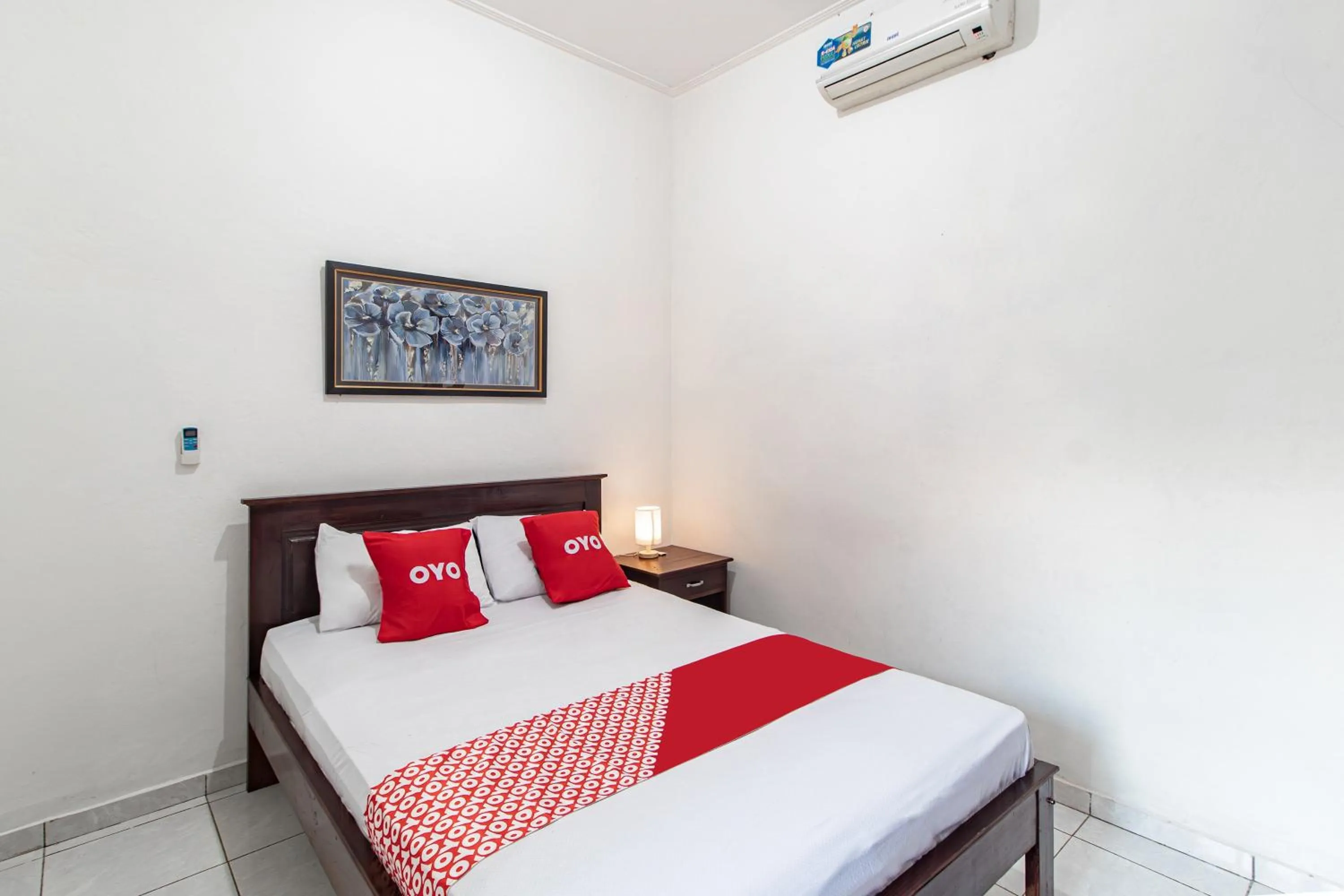 Bedroom in OYO 93482 Penginapan Tenang Lovina