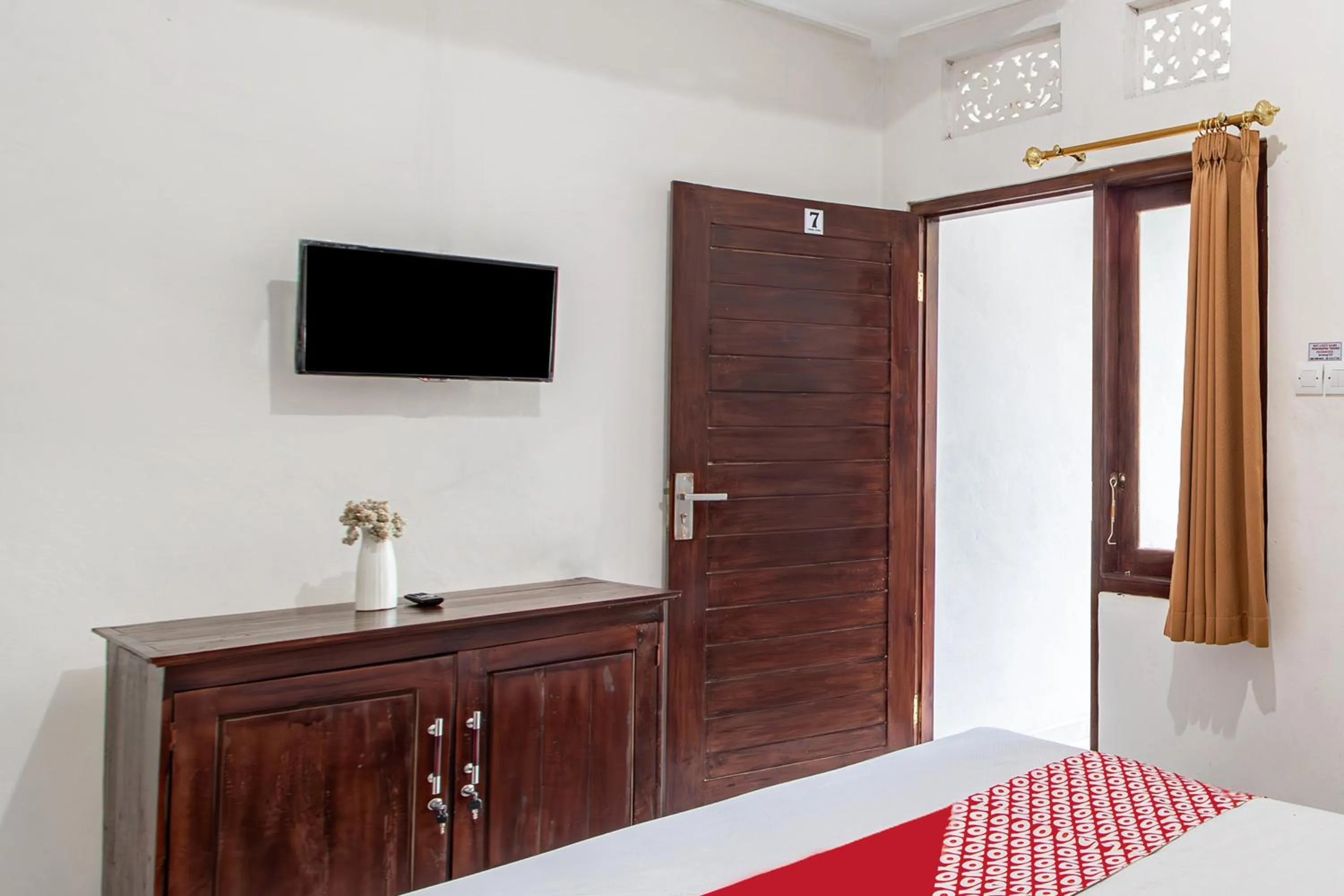 Bedroom in OYO 93482 Penginapan Tenang Lovina