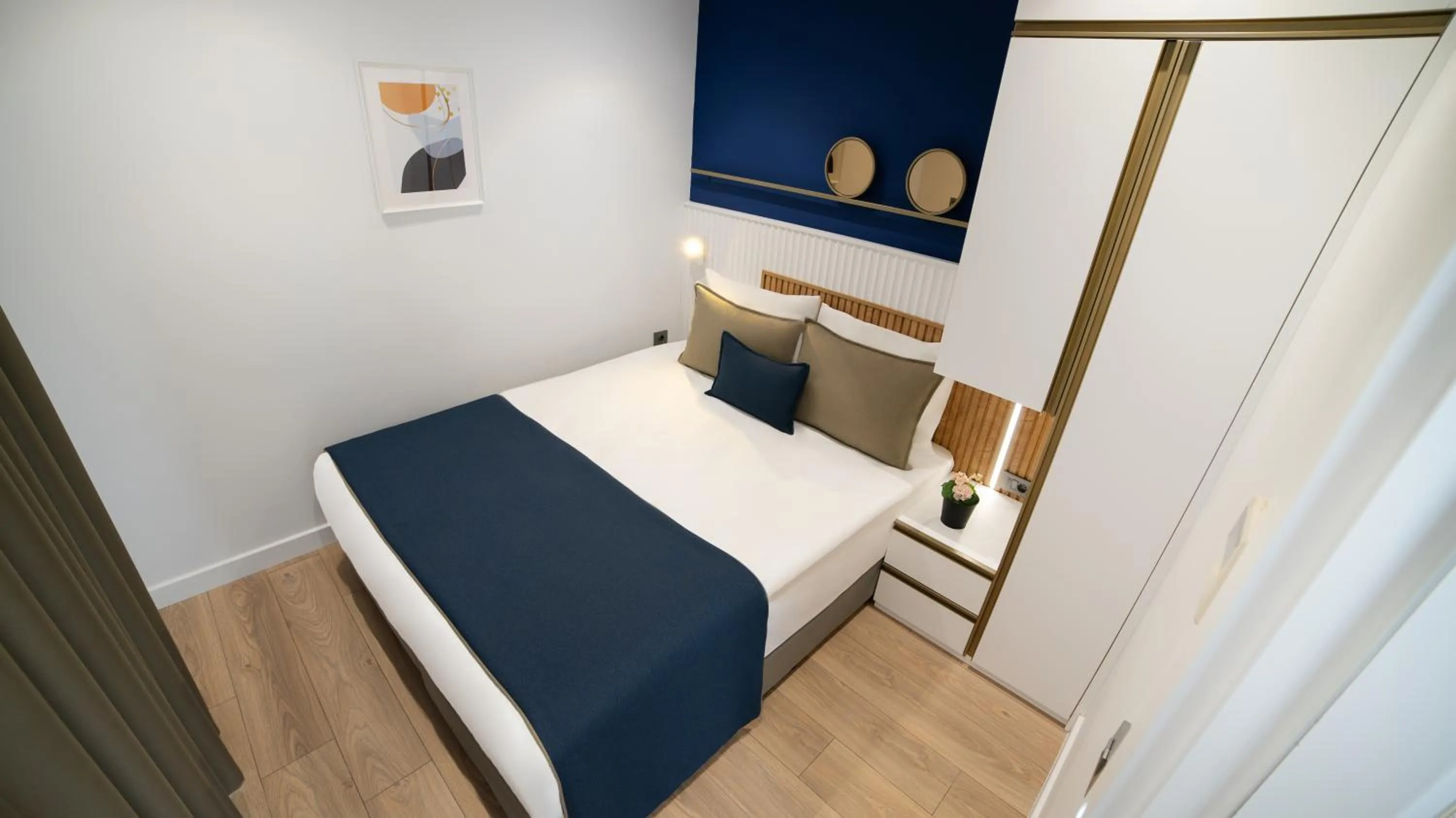 Bed in Stile Suite Marine Hotel