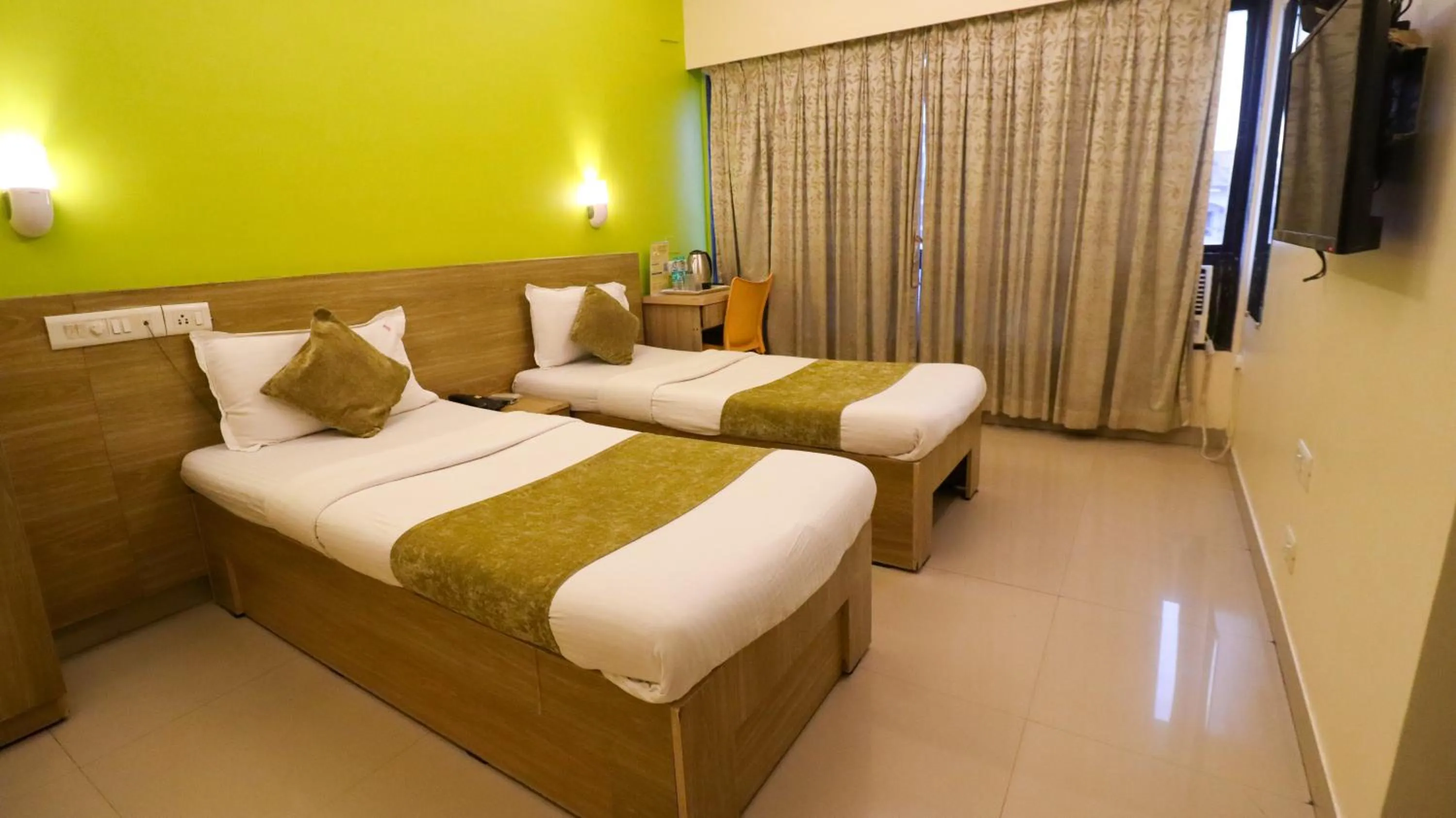 Bedroom, Bed in Tuliip Residency