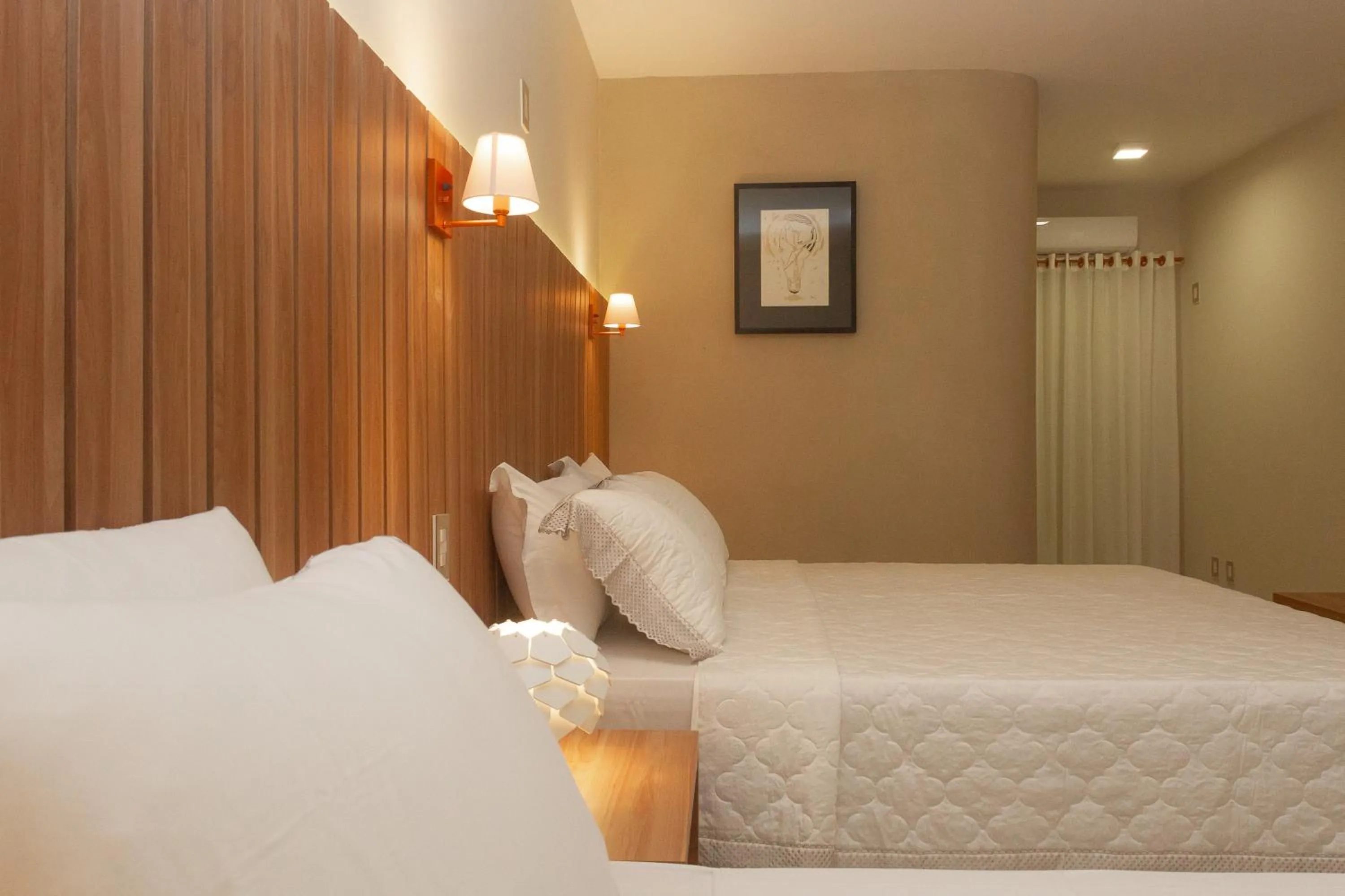 Bed in Principe do Mutá Hotel Design