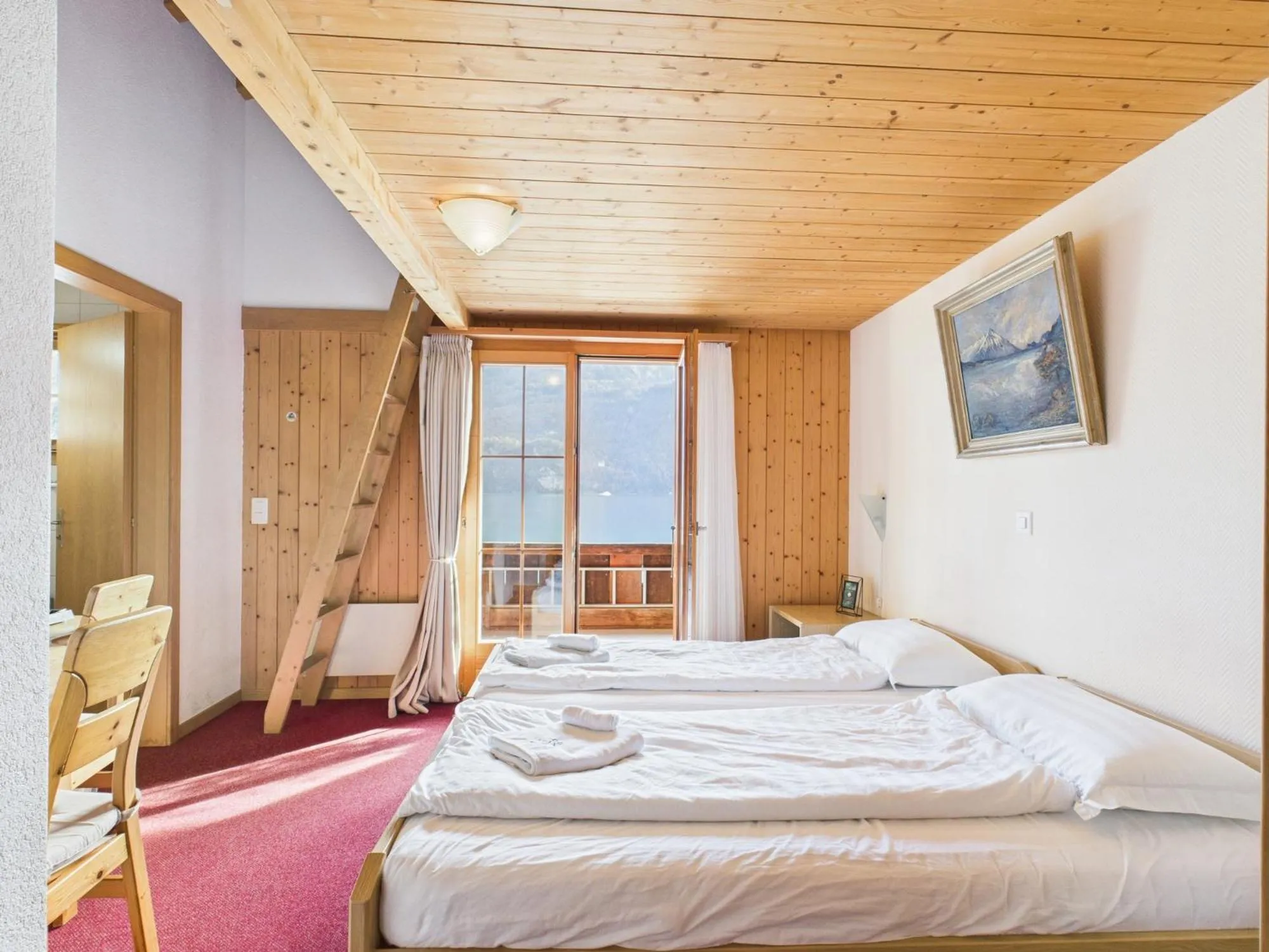 Balcony/Terrace, Bed in Hotel Wildbach Brienz