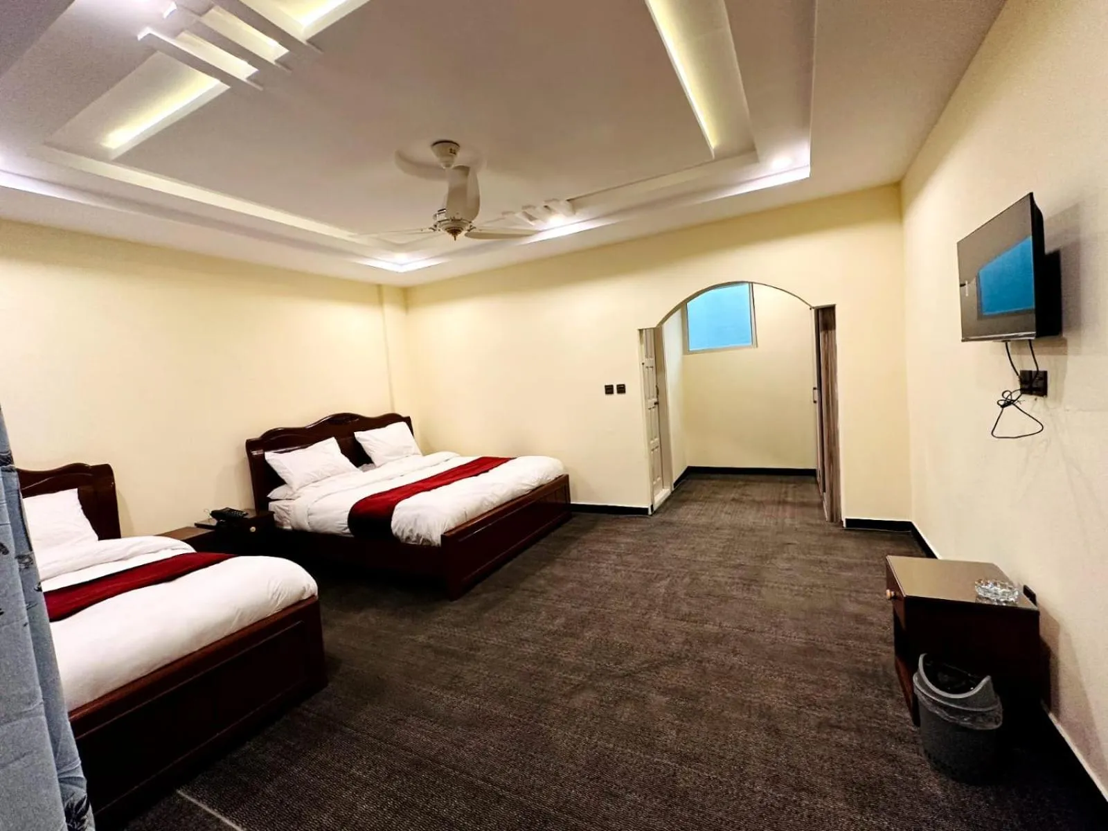 Communal lounge/ TV room, Bed in Desert One Hotel Skardu