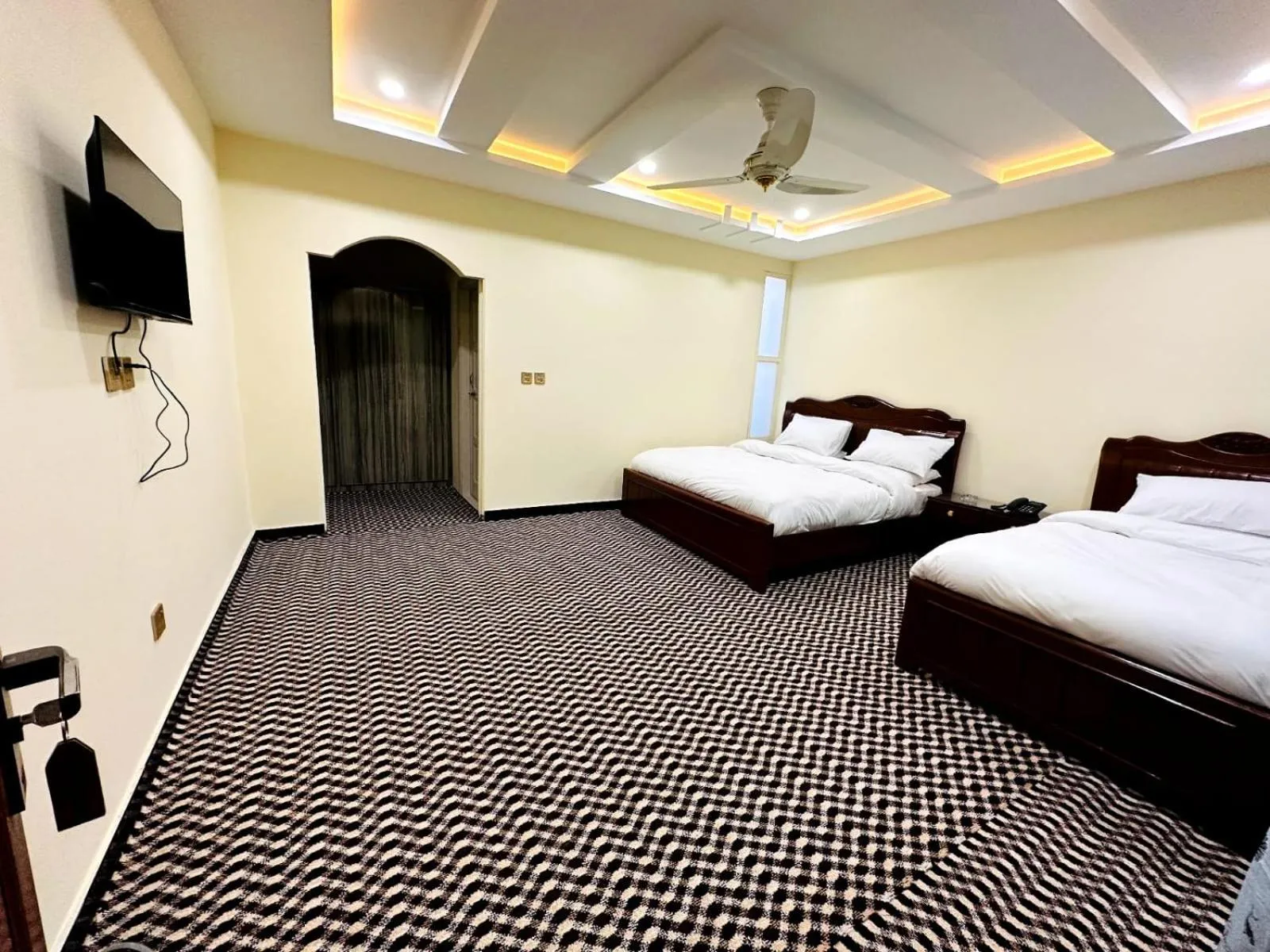 Communal lounge/ TV room, Bed in Desert One Hotel Skardu