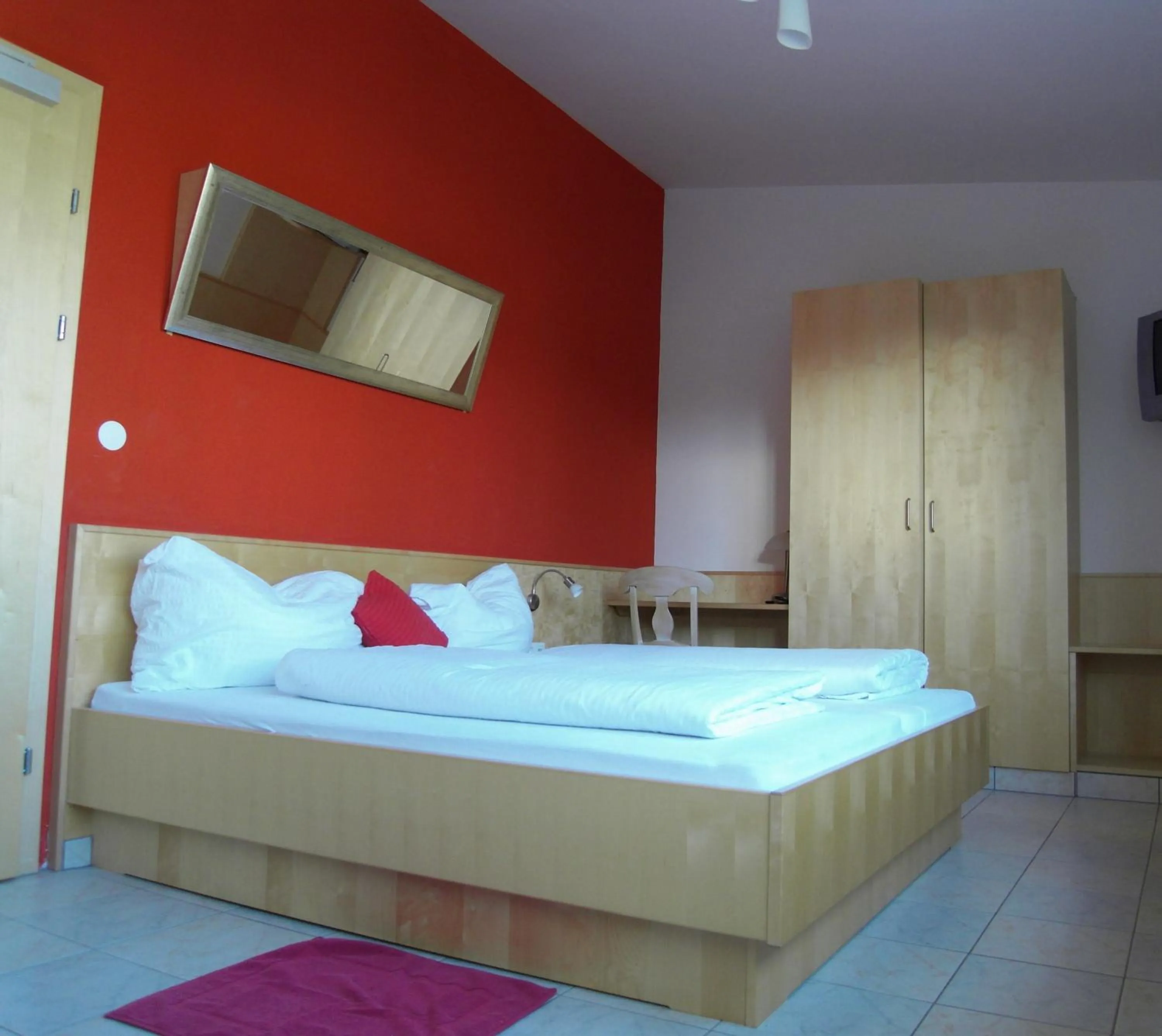 Bed in Weinhotel Kirchenwirt