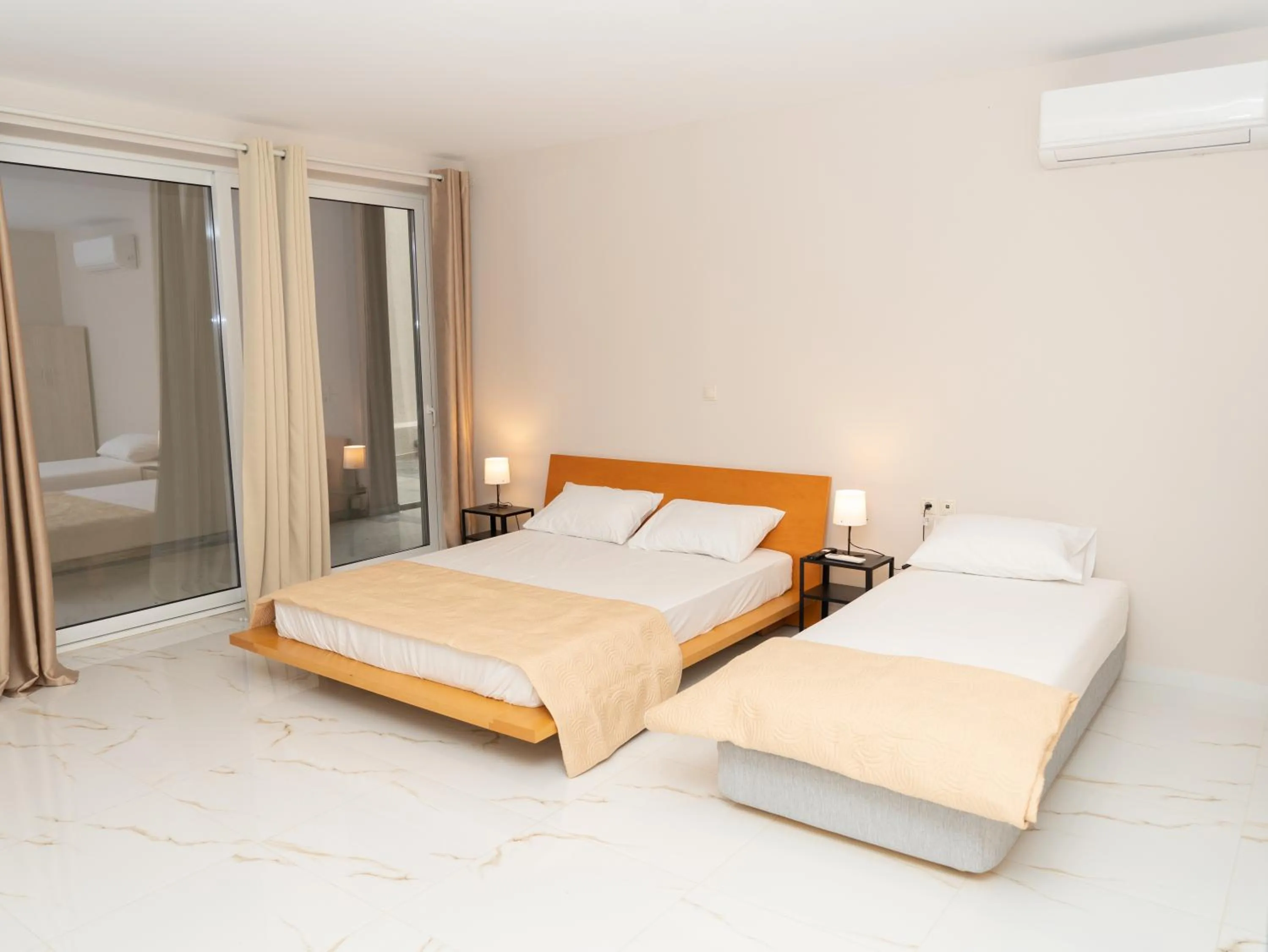 Photo of the whole room, Bed in ALLAGIANNIS GROUP APARTMENTS
