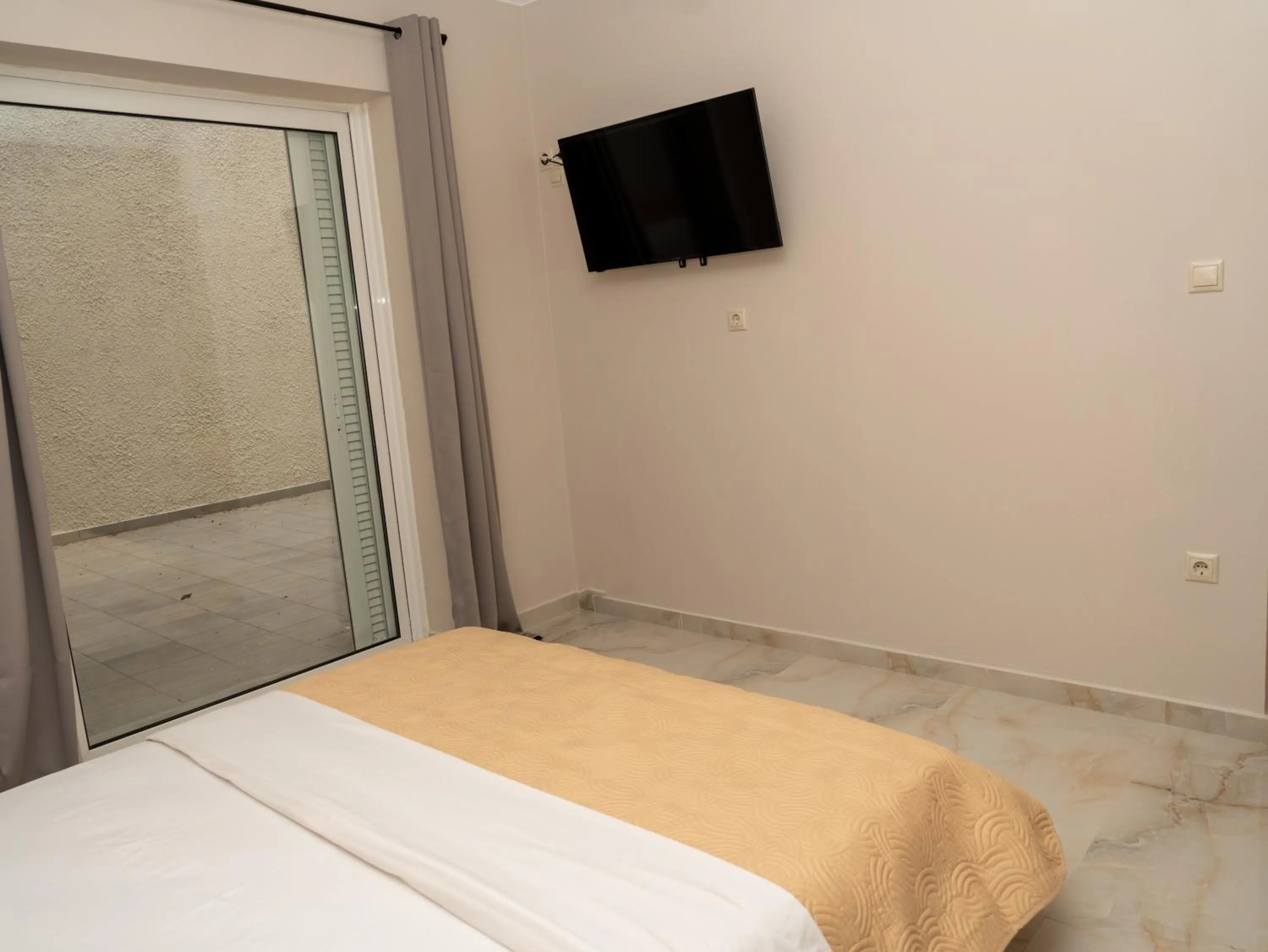 Photo of the whole room, Bed in ALLAGIANNIS GROUP APARTMENTS