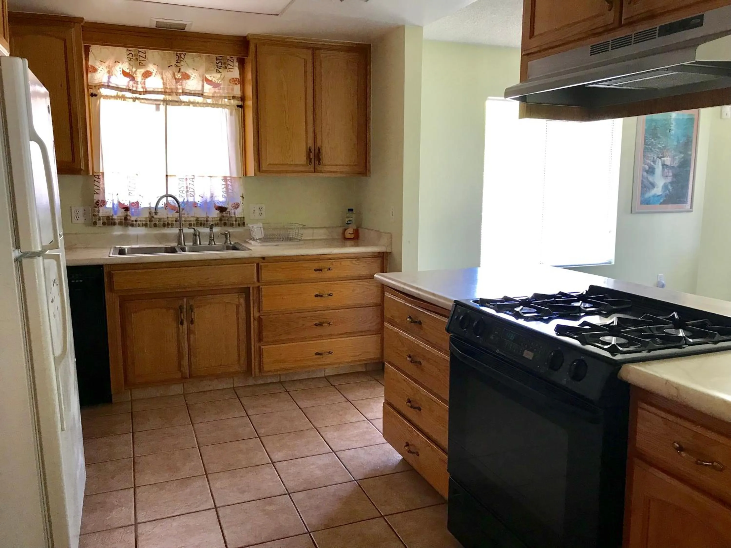 Kitchen or kitchenette in The River Inn