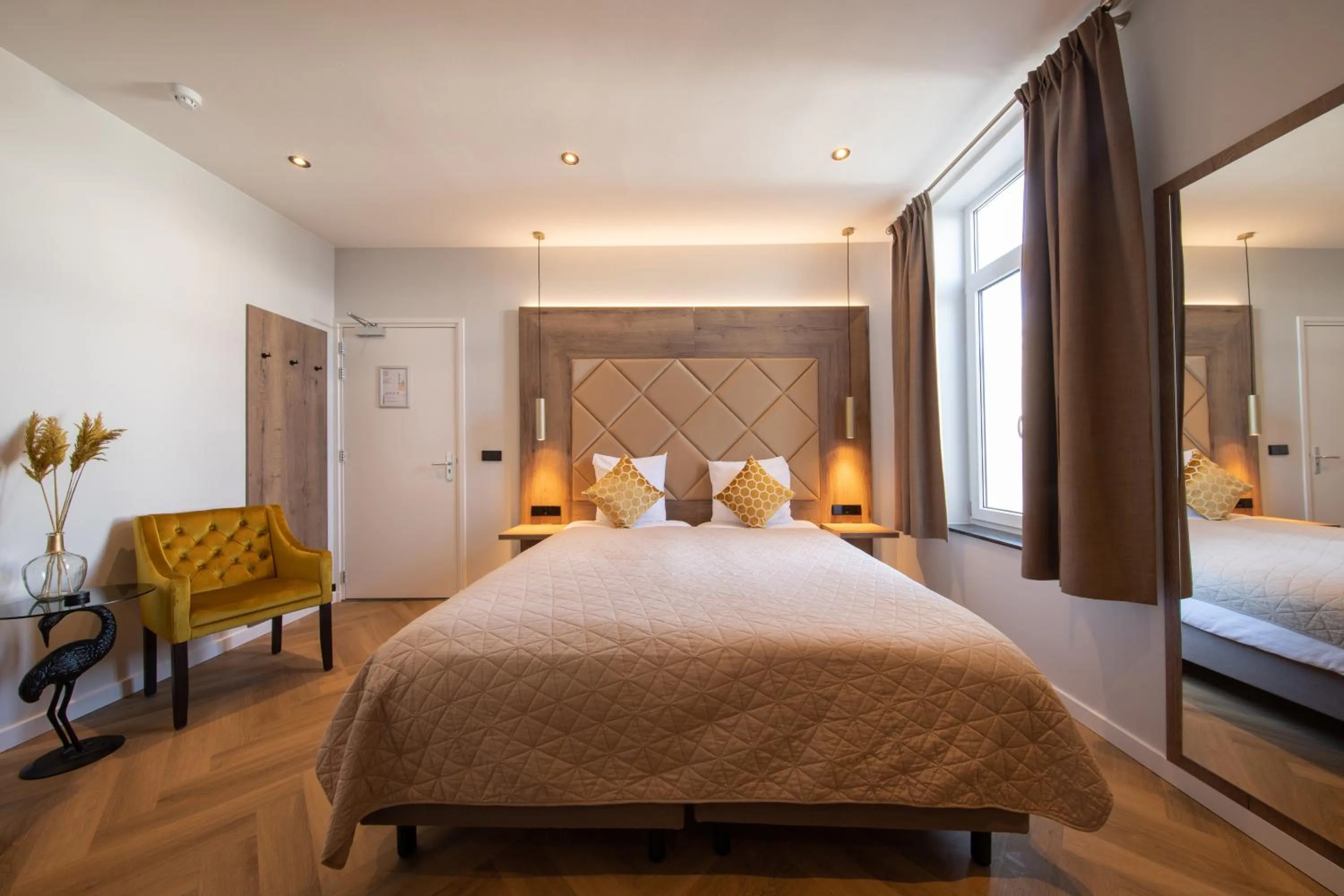 Comfort Quadruple Room in Boutique Hotel Scheepers