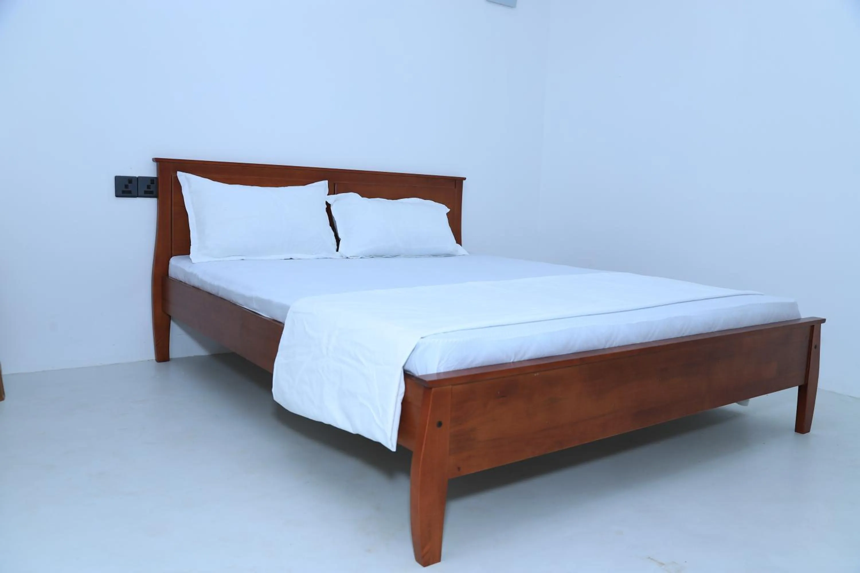 Bed in Palm Beach Resort Ceylon