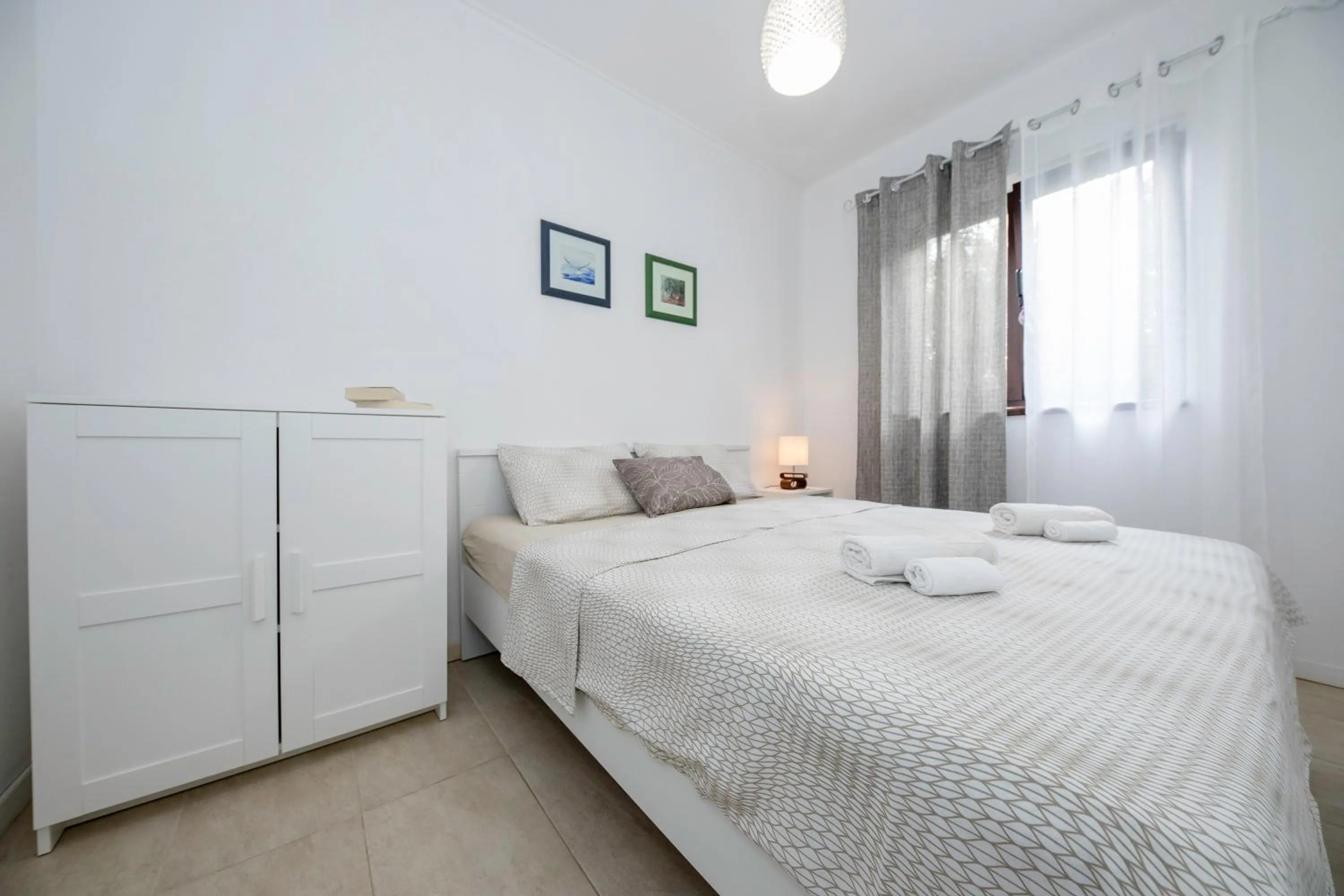 Bed in Miral Apartments