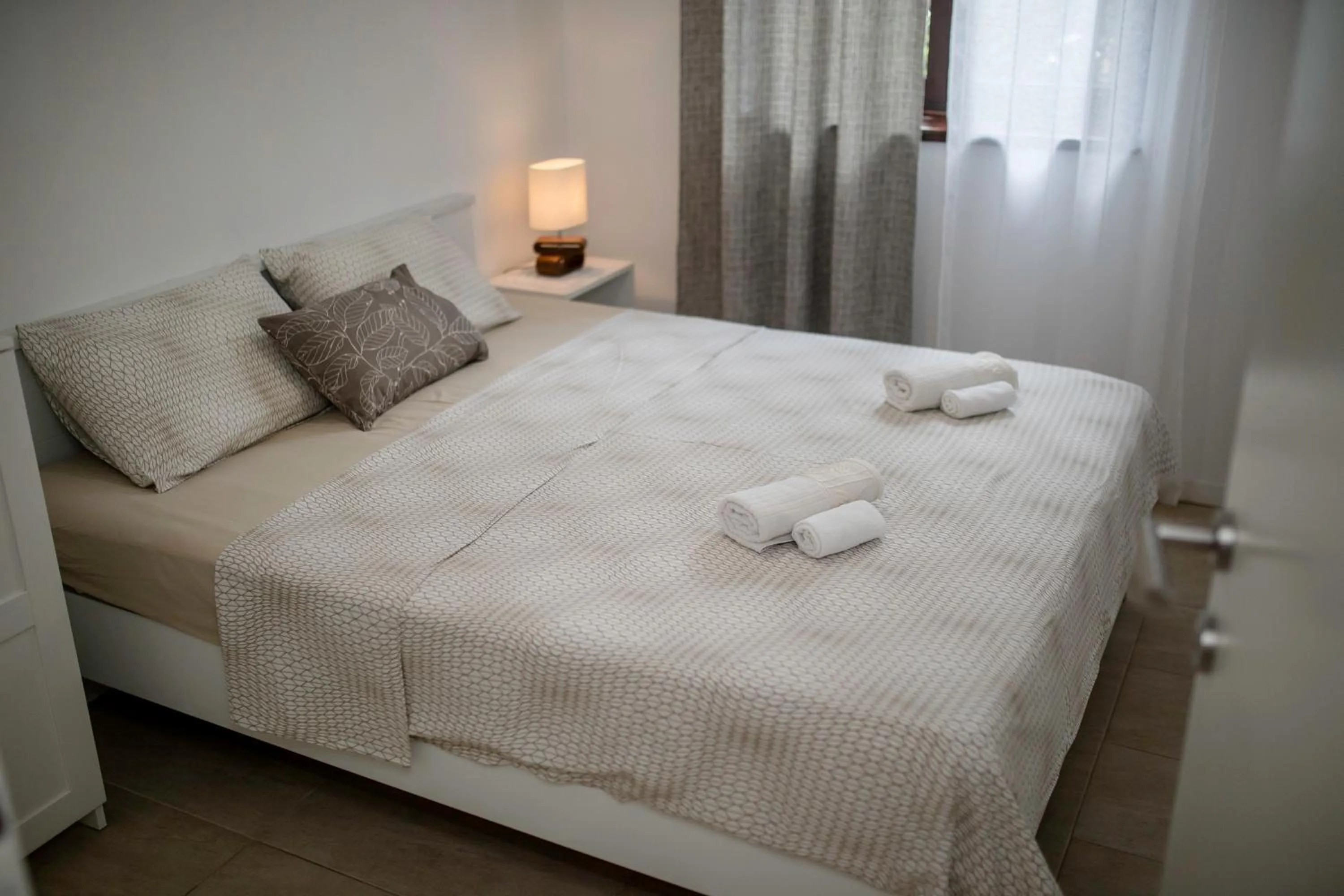 Bed in Miral Apartments