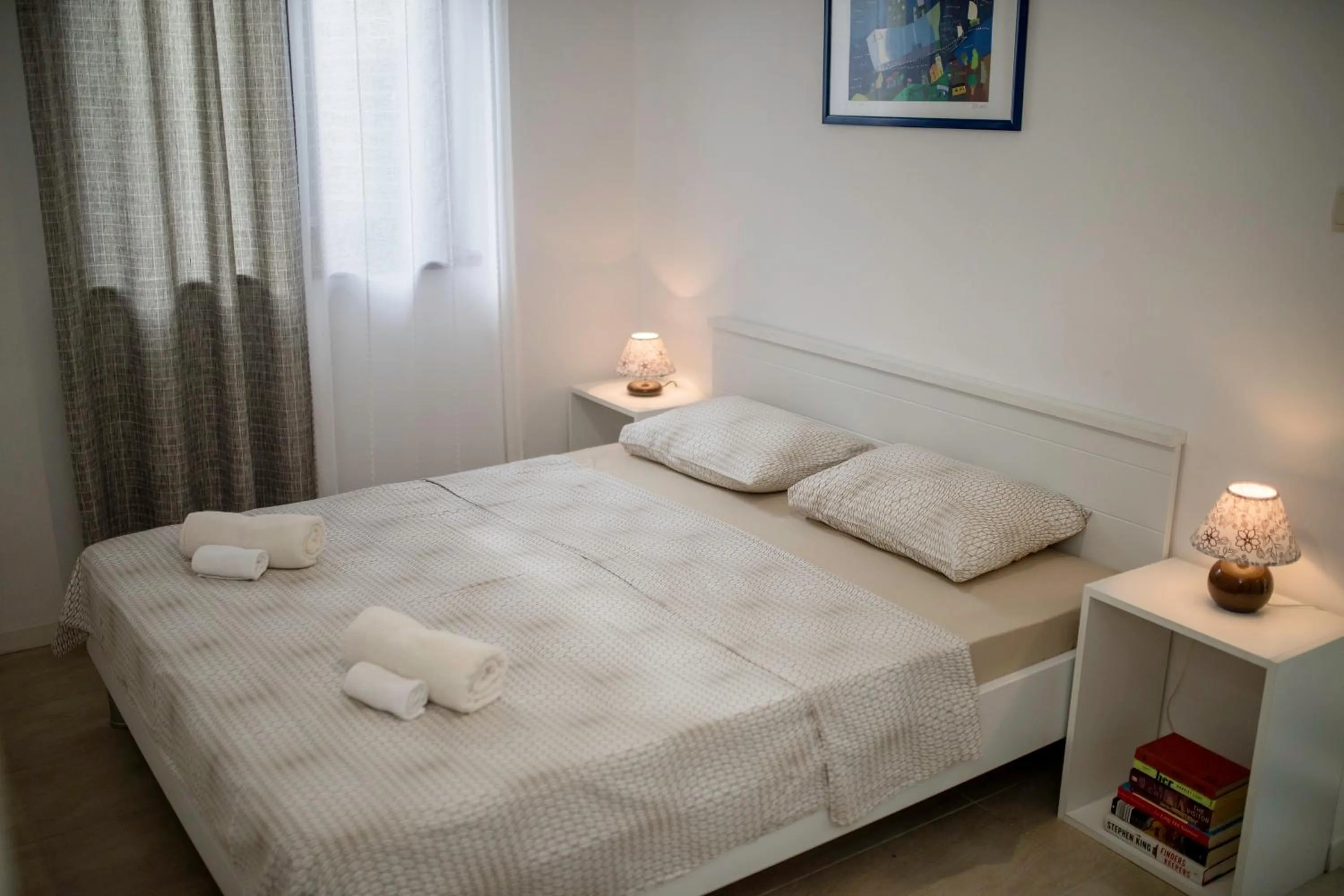 Bed in Miral Apartments