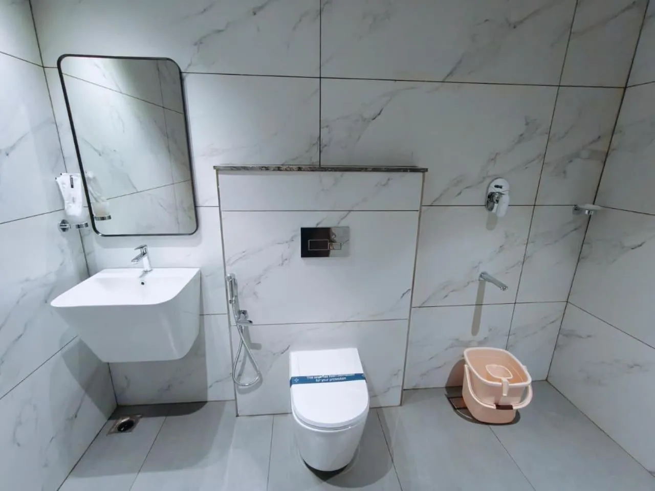 Toilet in Mayo Suites