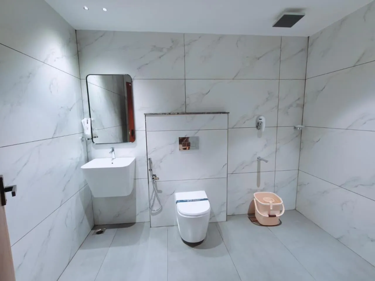 Toilet in Mayo Suites