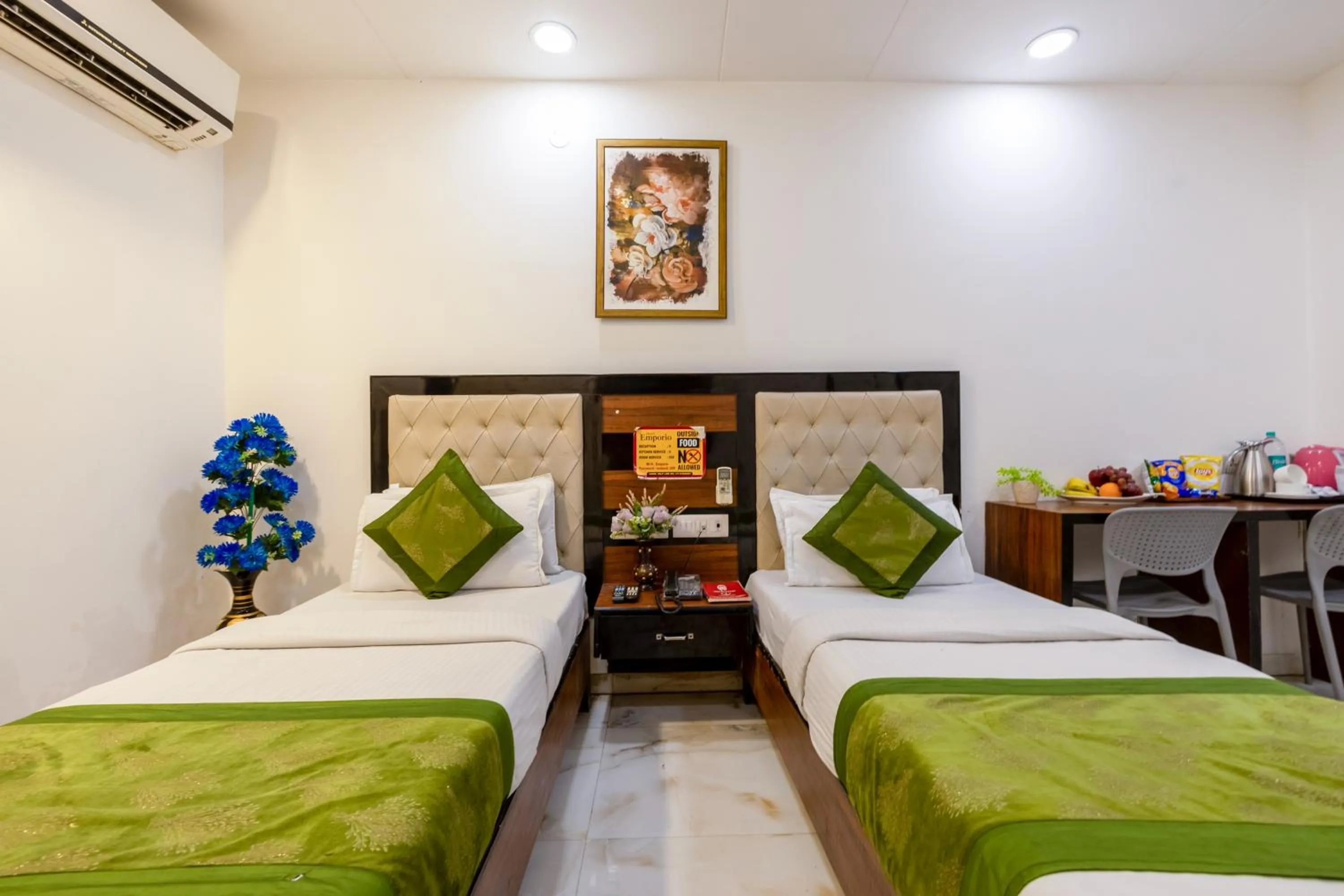 Photo of the whole room, Bed in Hotel Emporio Near New Delhi Railway Station - Paharganj