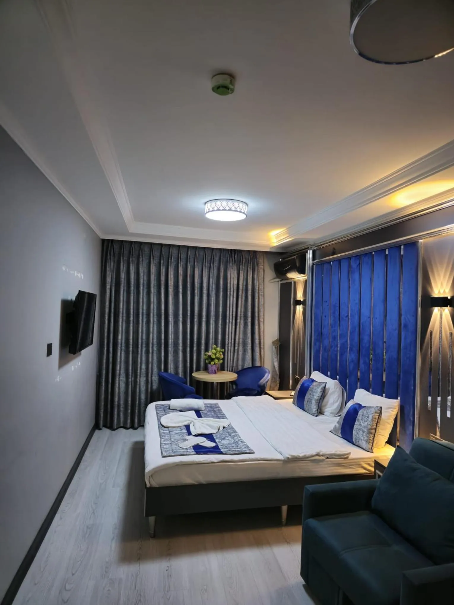 Bed in BLUE PLUS HOTEL