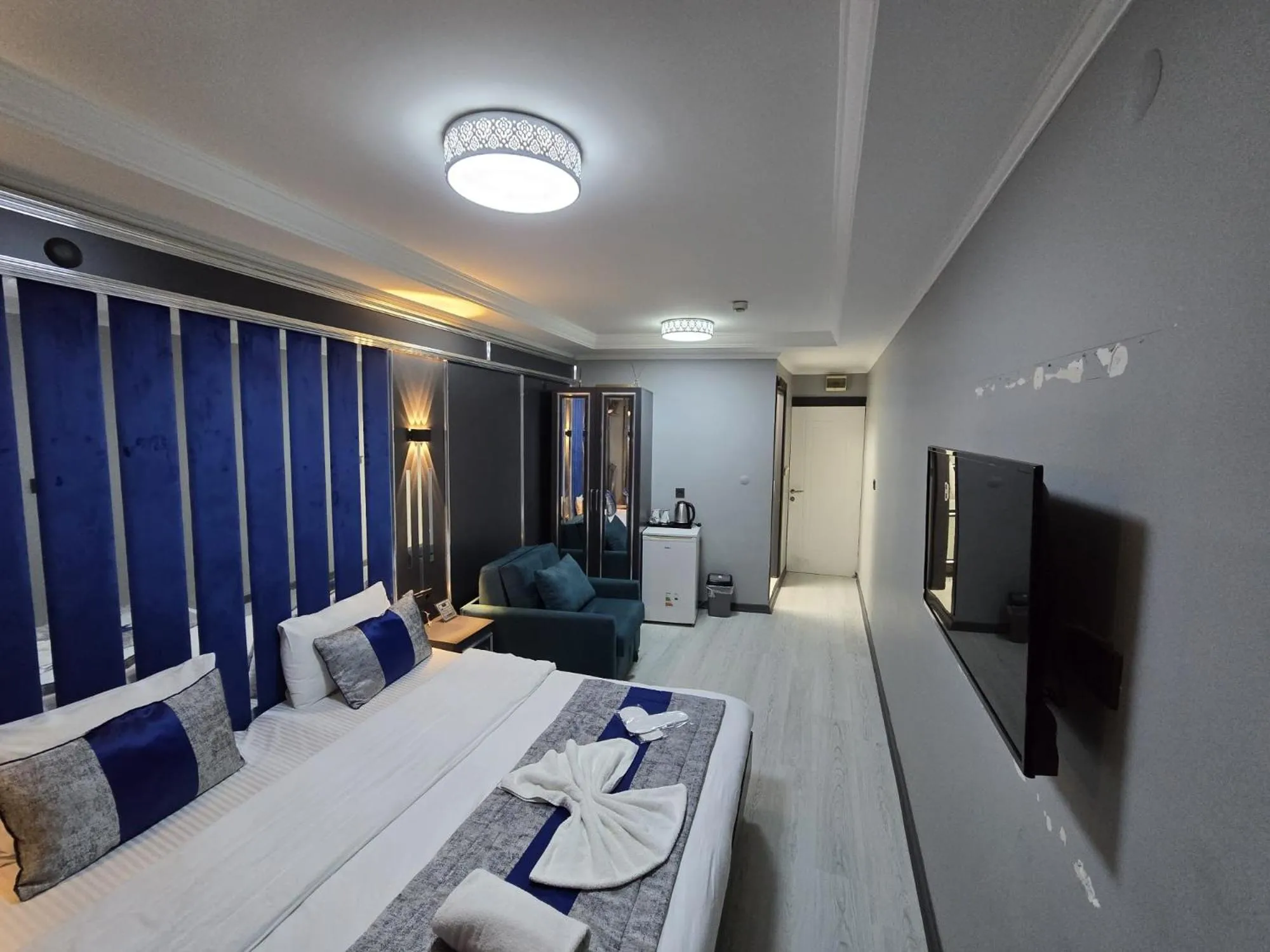 Bed in BLUE PLUS HOTEL