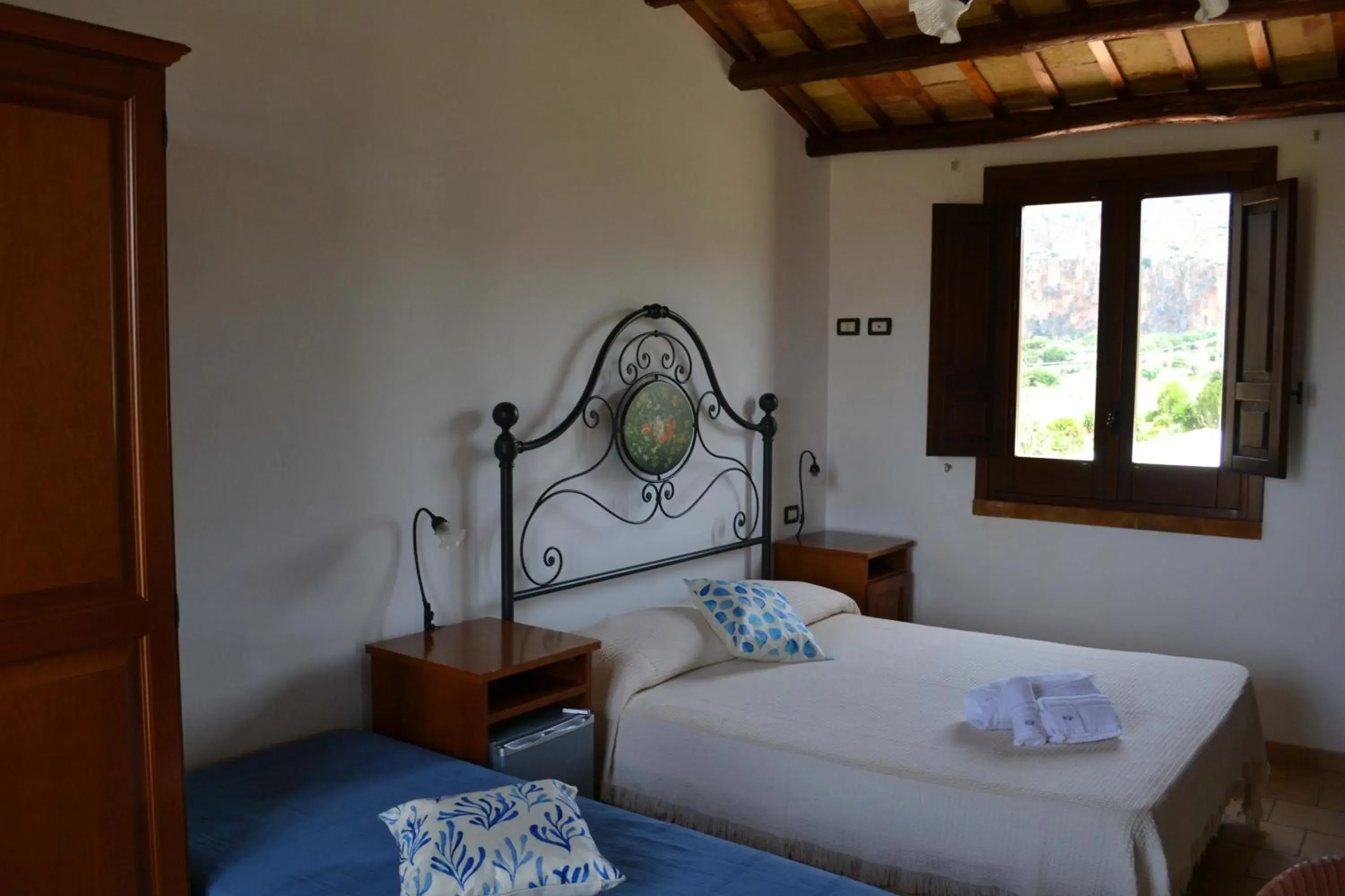 Comfort Triple Room in HOTEL Cala Buguto Comfort Triple Room in HOTEL Cala Buguto