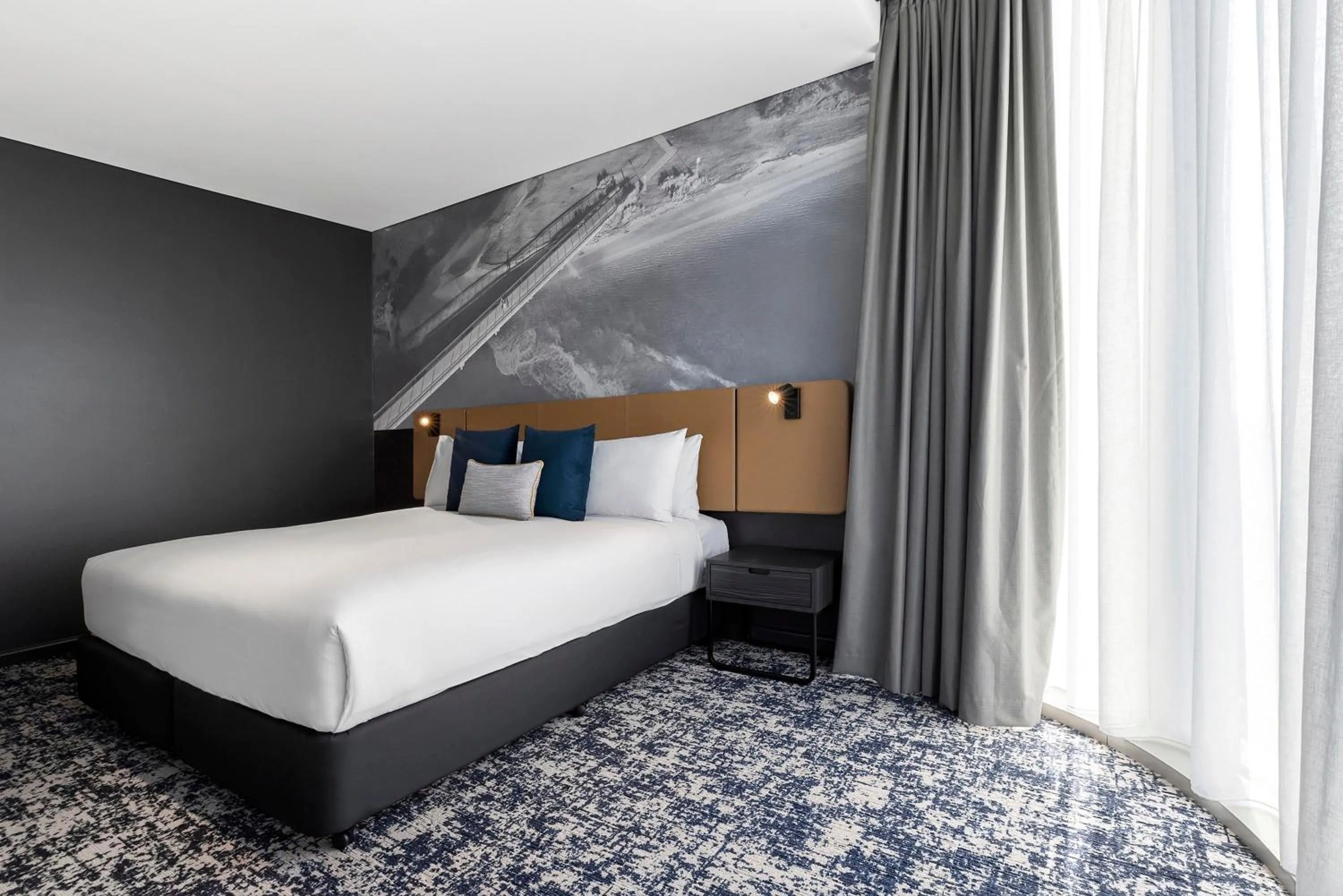 Bed in Citadines Walker North Sydney