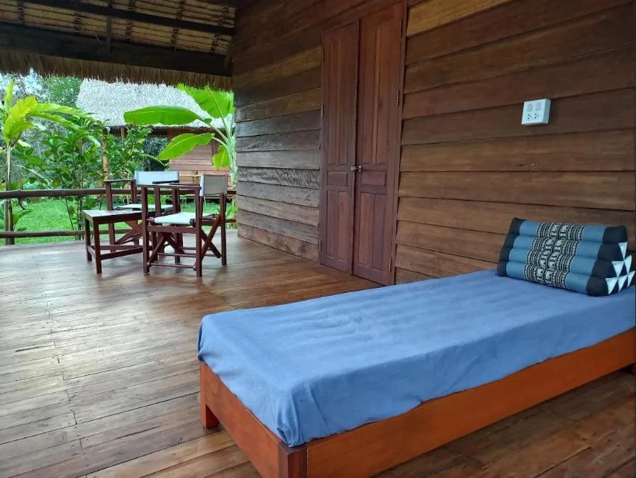 View (from property/room), Bed in Naga Lodge