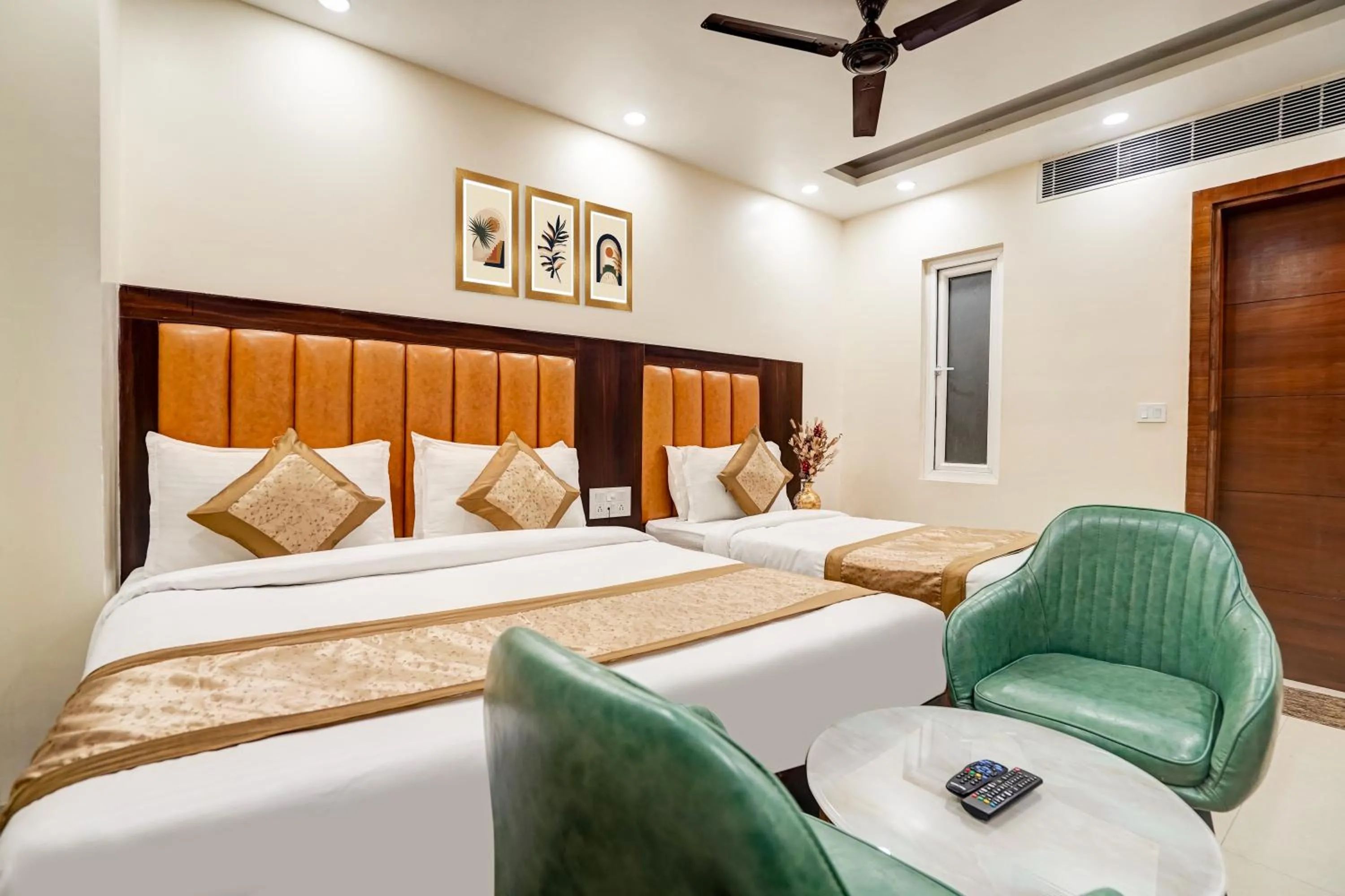 Photo of the whole room, Bed in Hotel Royal Rosette Near New Delhi Railway Station - Connaught Place and VFS