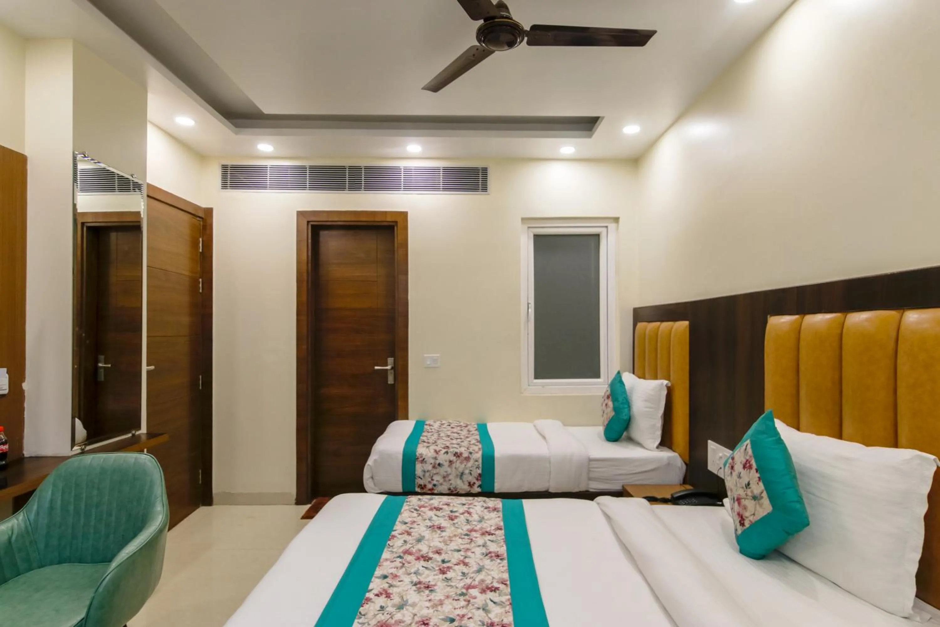 Photo of the whole room, Bed in Hotel Royal Rosette Near New Delhi Railway Station - Connaught Place and VFS