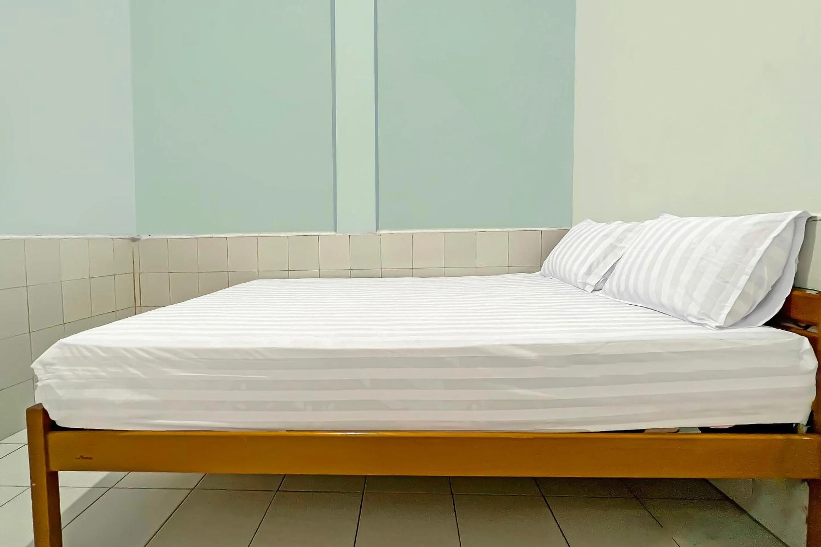 Bedroom, Bed in Hotel O Oma Homestay