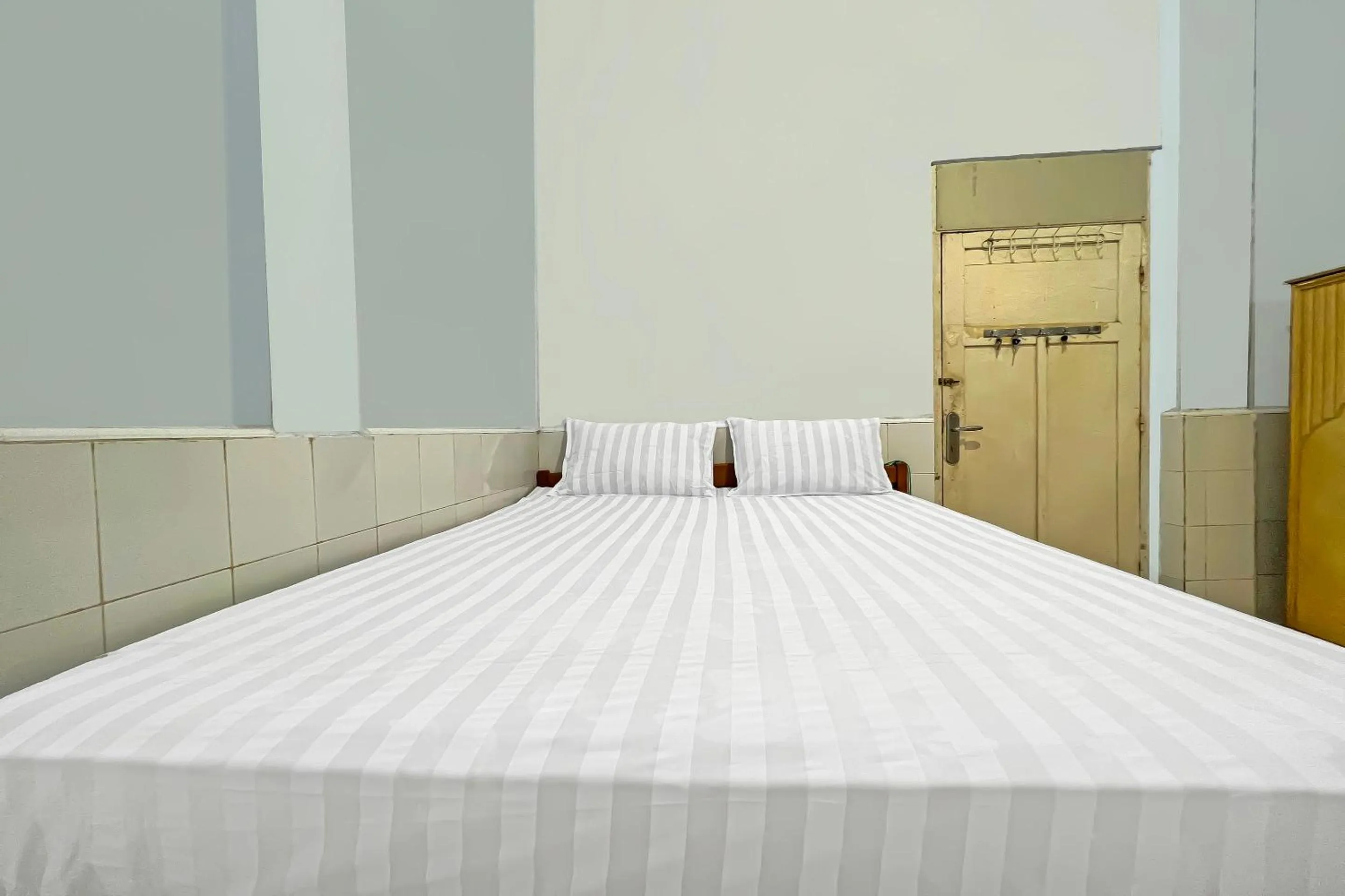 Bedroom, Bed in Hotel O Oma Homestay