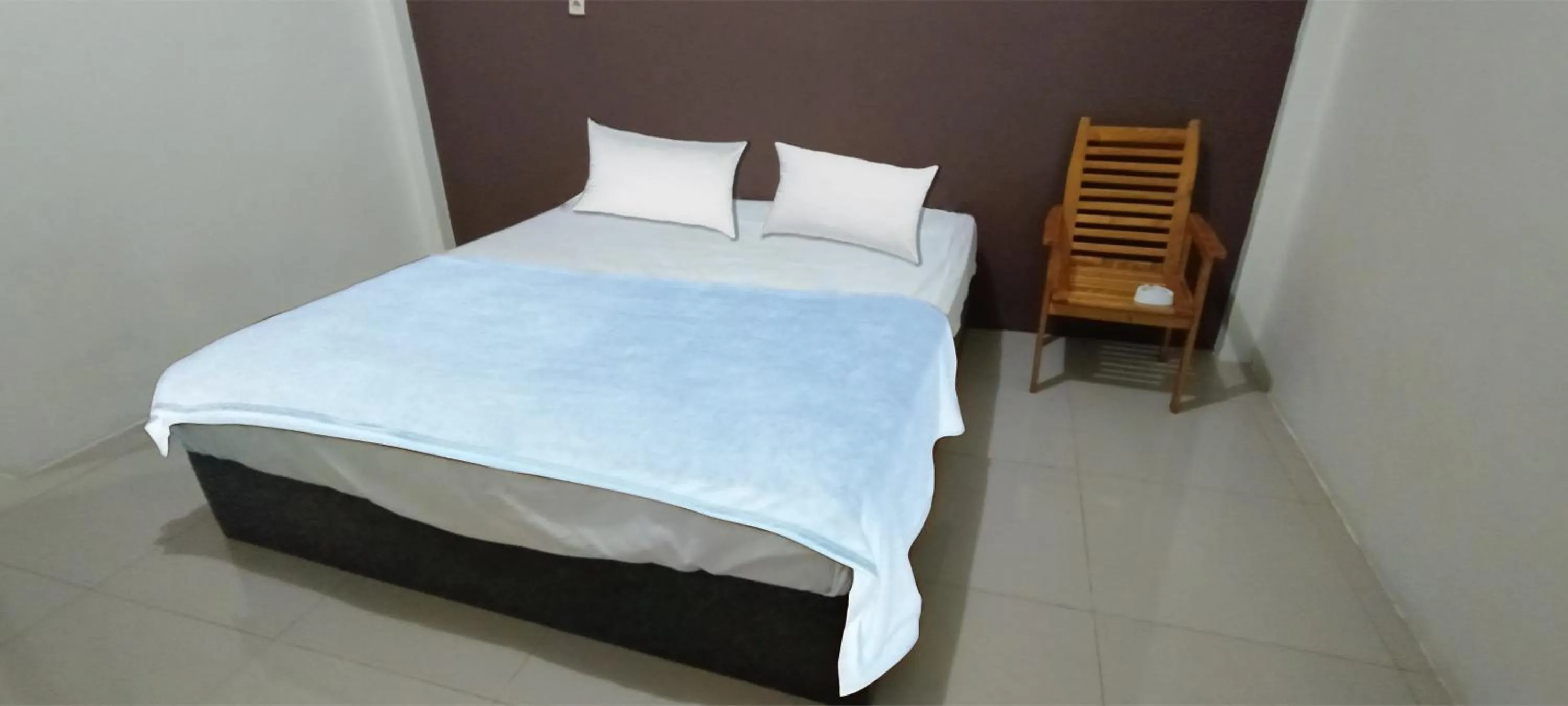 Bedroom, Bed in Hotel O Wisma Deli Syariah Near RSUD Nene Mallomo Sidenreng Rappang