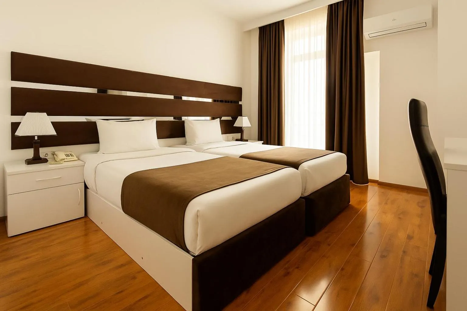 Bed in Hotel Grand Palace