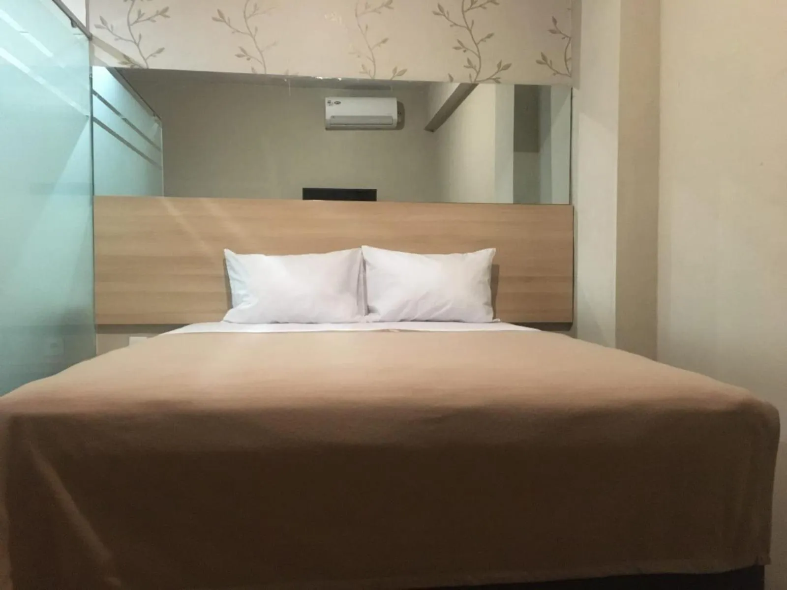 Bed in Royal Guesthouse Bandar Lampung