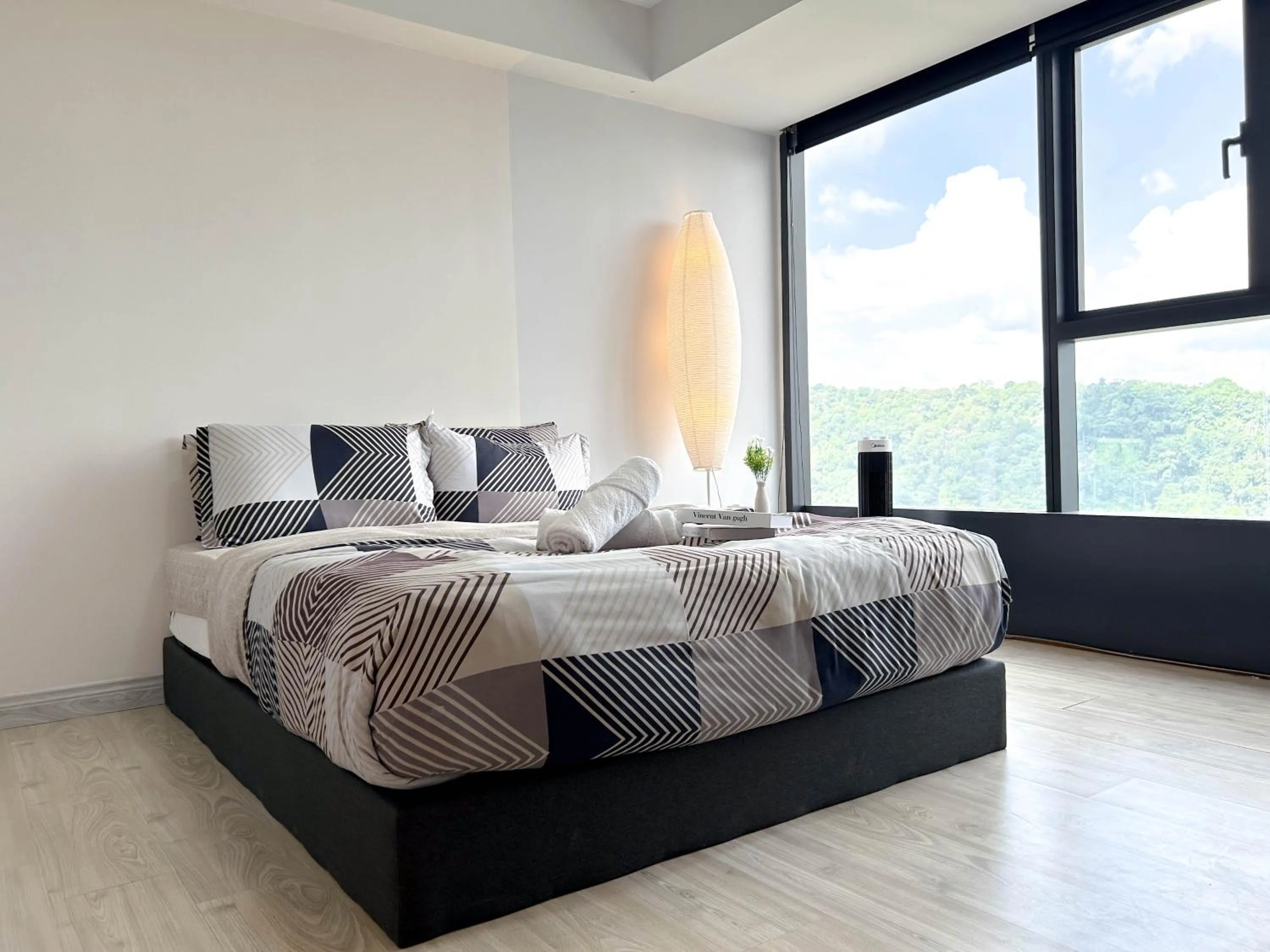 Bed in Empire City PJ Studio Suites by Manhattan Group