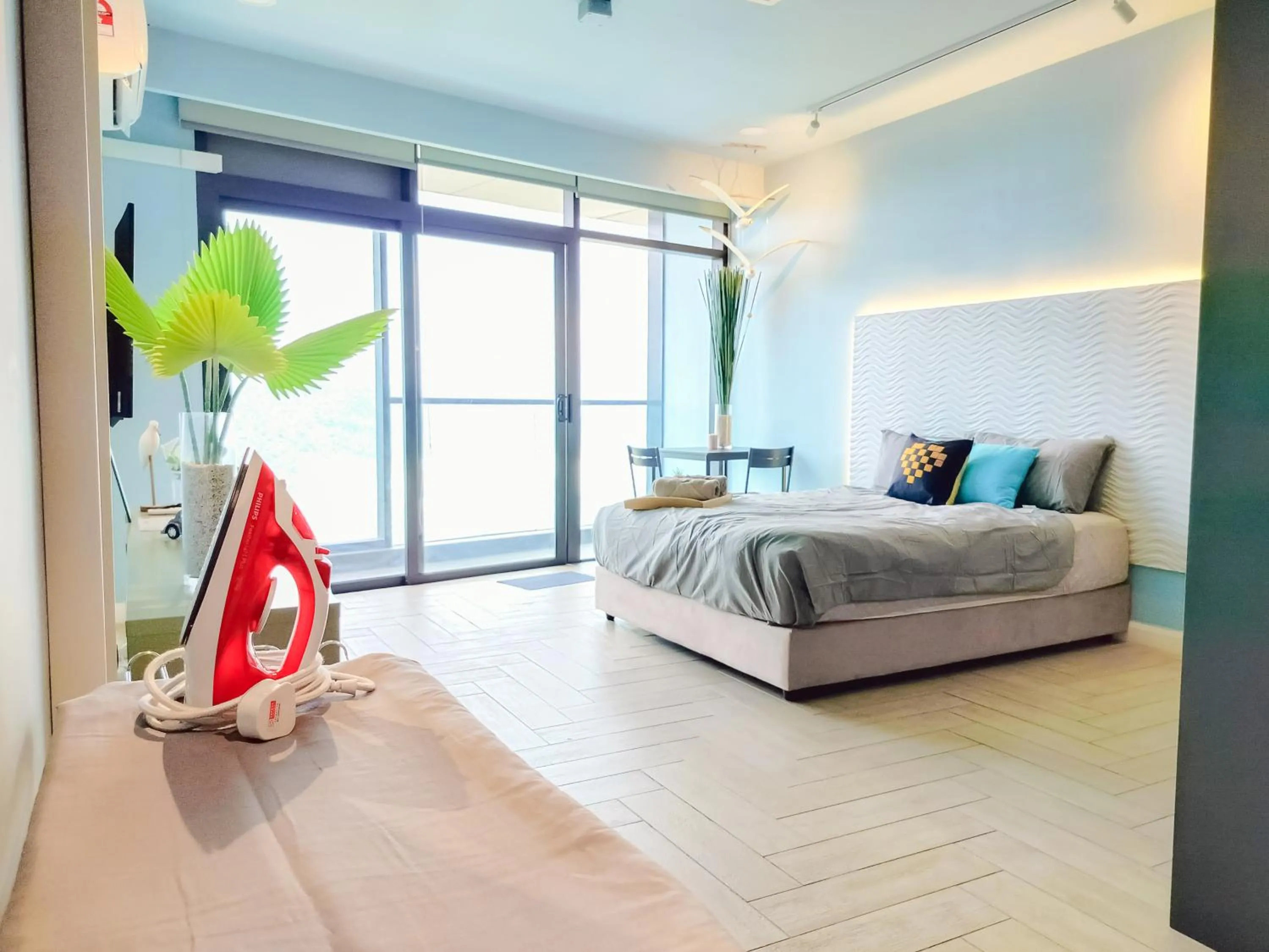 Bed in Empire City PJ Studio Suites by Manhattan Group