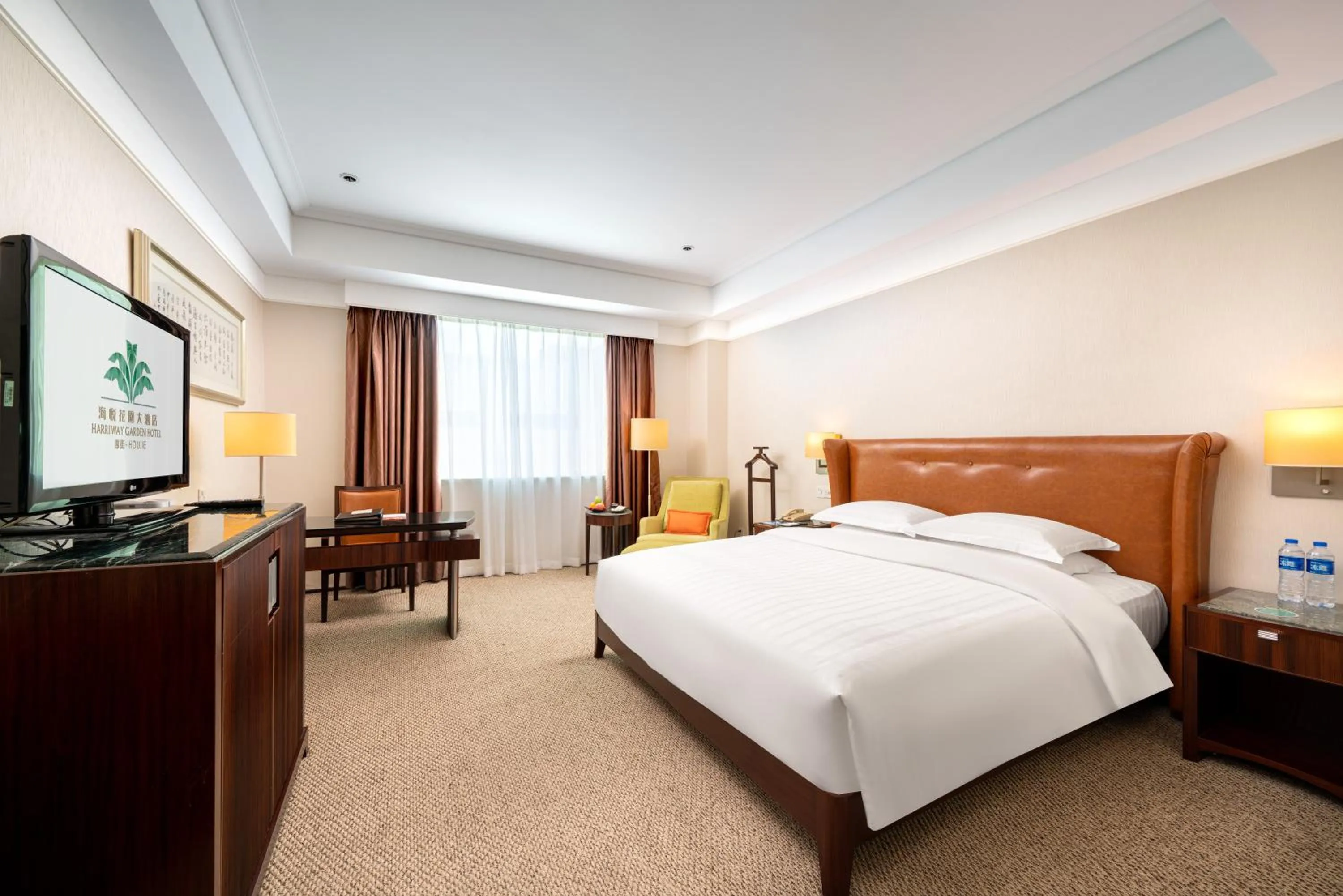 Bed in Harriway Garden Hotel Houjie