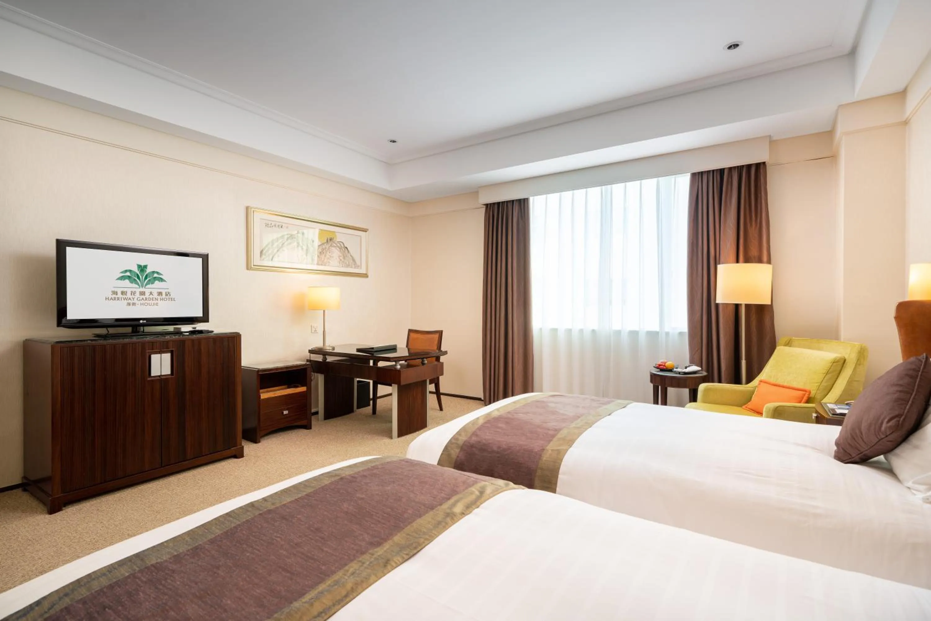 Bed in Harriway Garden Hotel Houjie