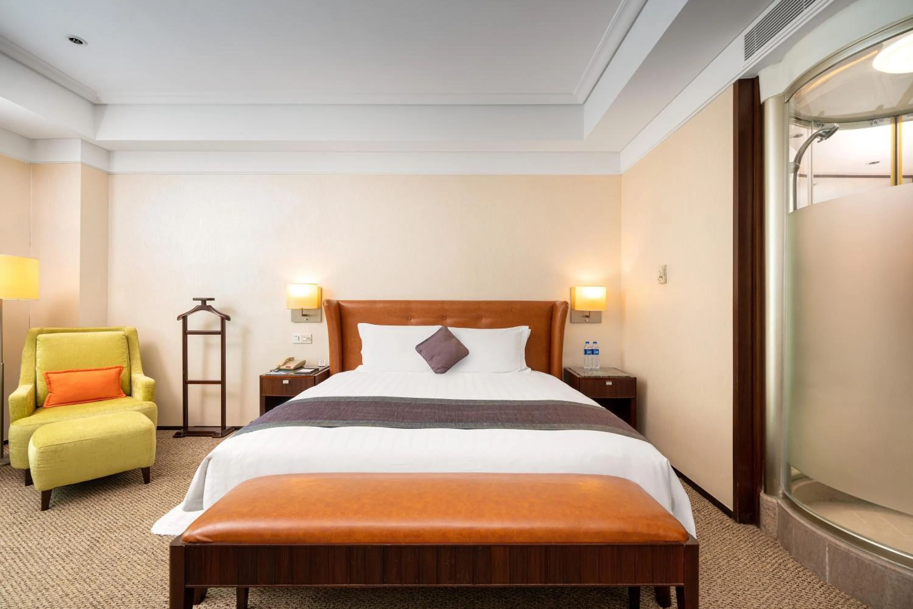 Bed in Harriway Garden Hotel Houjie