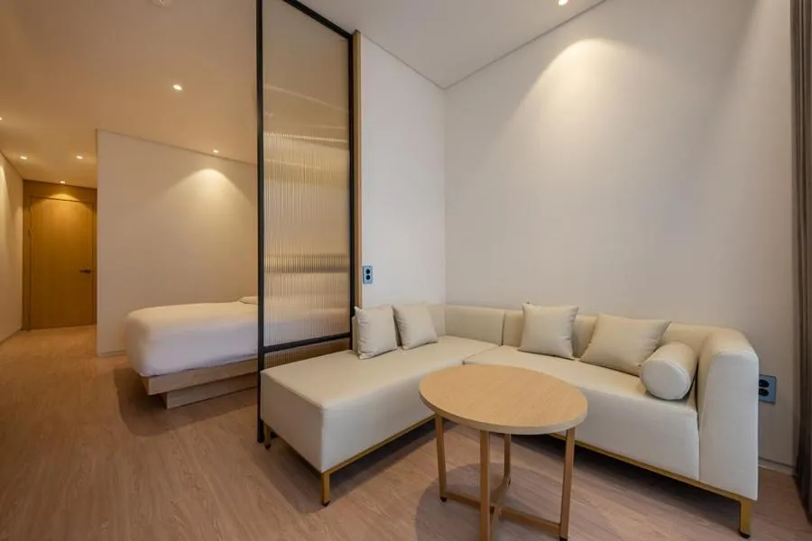 Bed in Masan Daisy Hotel